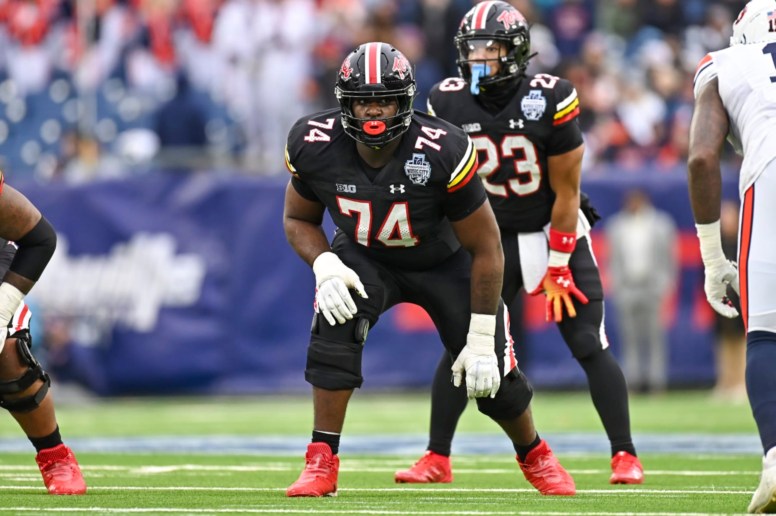 NASHVILLE, TN - DECEMBER 30: Maryland offensive lineman Delmar Glaze (74) in action during the TransPerfect Music City Bowl, between the Auburn Tigers and the Maryland Terrapins on December 30, 2023 at Nissan Stadium in Nashville, TN. (Photo by Kevin Langley/Icon Sportswire via Getty Images) NASHVILLE, TN - DECEMBER 30: Maryland offensive lineman Delmar Glaze (74) in action during the TransPerfect Music City Bowl, between the Auburn Tigers and the Maryland Terrapins on December 30, 2023 at Nissan Stadium in Nashville, TN. (Photo by Kevin Langley/Icon Sportswire via Getty Images)