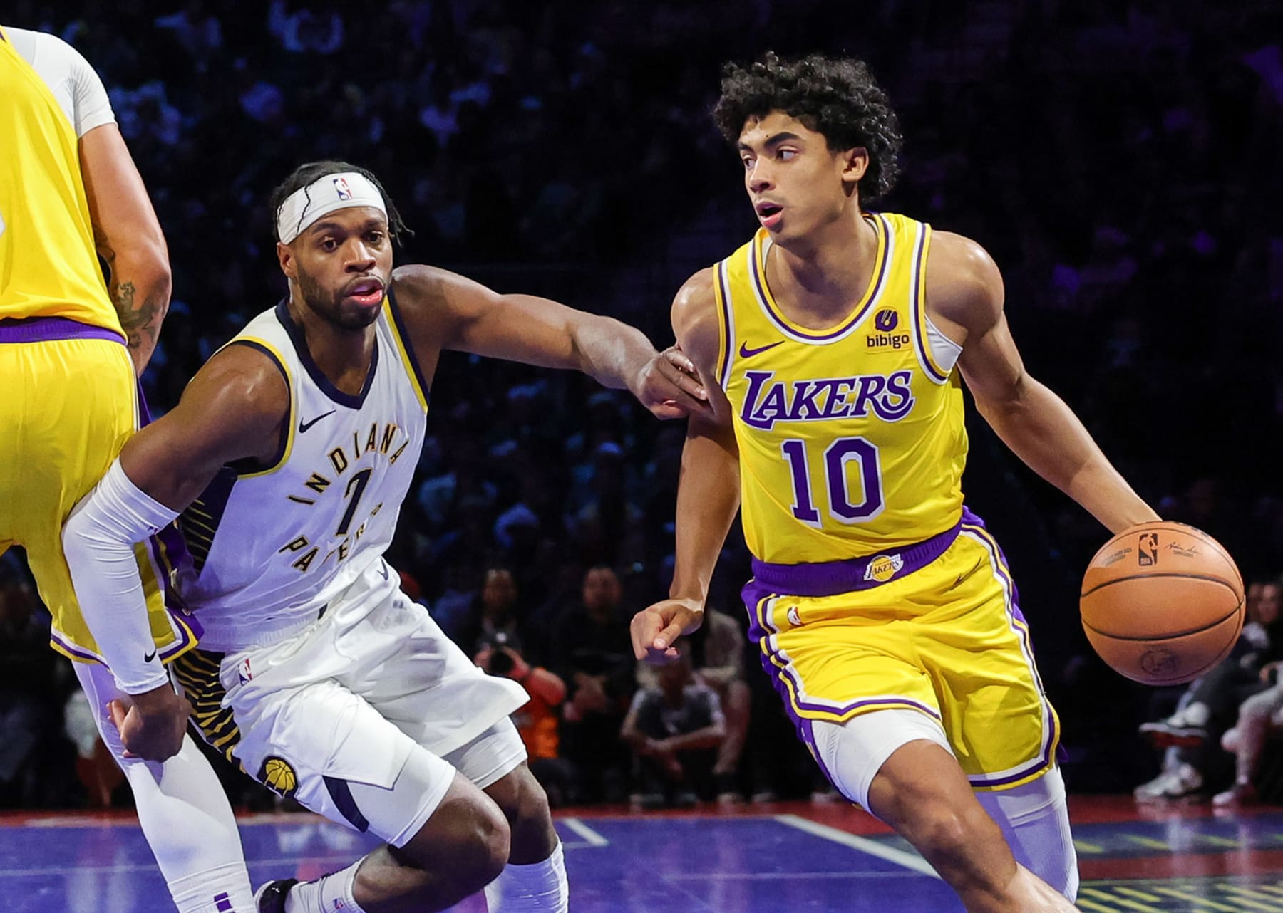 LAS VEGAS, NEVADA - DECEMBER 09: Max Christie #10 of the Los Angeles Lakers drives against Buddy Hield #7 of the Indiana Pacers in the first quarter of the championship game of the inaugural NBA In-Season Tournament at T-Mobile Arena on December 09, 2023 in Las Vegas, Nevada. The Lakers defeated the Pacers 123-109. NOTE TO USER: User expressly acknowledges and agrees that, by downloading and or using this photograph, User is consenting to the terms and conditions of the Getty Images License Agreement. (Photo by Ethan Miller/Getty Images)
