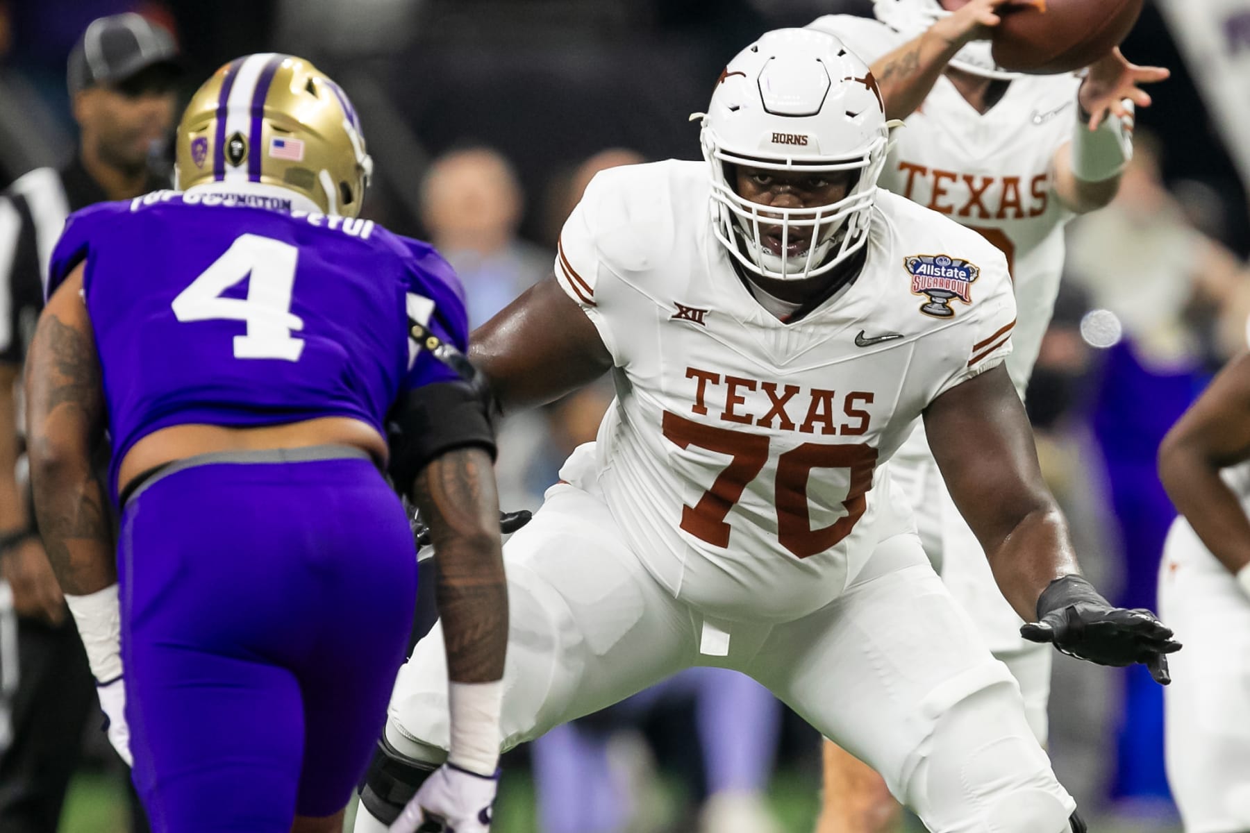 NEW ORLEANS, LA - JANUARY 01: Texas offensive lineman Christian Jones (70) prepares to block during the Allstate Sugar Bowl playoff game between the Texas Longhorns and the Washington Huskies on Monday, January 1, 2024 at Caesars Superdome in New Orleans, LA.  (Photo by Nick Tre. Smith/Icon Sportswire via Getty Images)