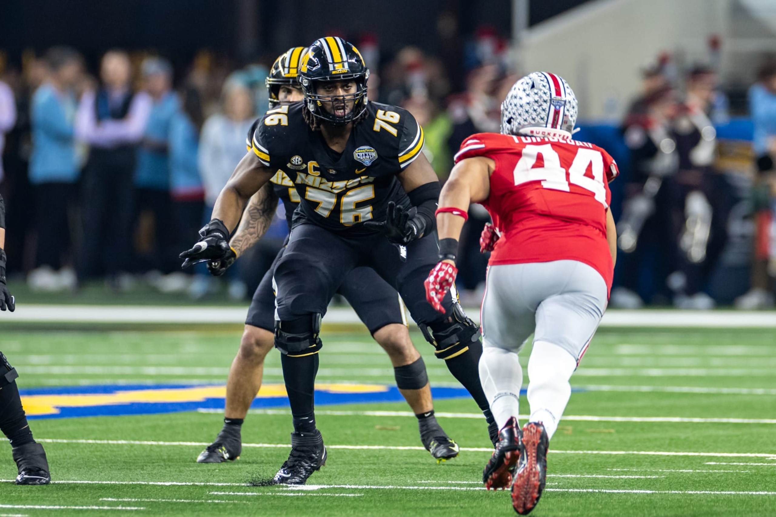 ARLINGTON, TX - DECEMBER 29: Missouri Tigers offensive lineman Javon Foster (#76) blocks during the Goodyear Cotton Bowl Classic football game between the Ohio State Buckeyes and Missouri Tigers on December 29, 2023 at AT&T Stadium in Arlington, TX. (Photo by Matthew Visinsky/Icon Sportswire via Getty Images) ARLINGTON, TX - DECEMBER 29: Missouri Tigers offensive lineman Javon Foster (#76) blocks during the Goodyear Cotton Bowl Classic football game between the Ohio State Buckeyes and Missouri Tigers on December 29, 2023 at AT&T Stadium in Arlington, TX. (Photo by Matthew Visinsky/Icon Sportswire via Getty Images)