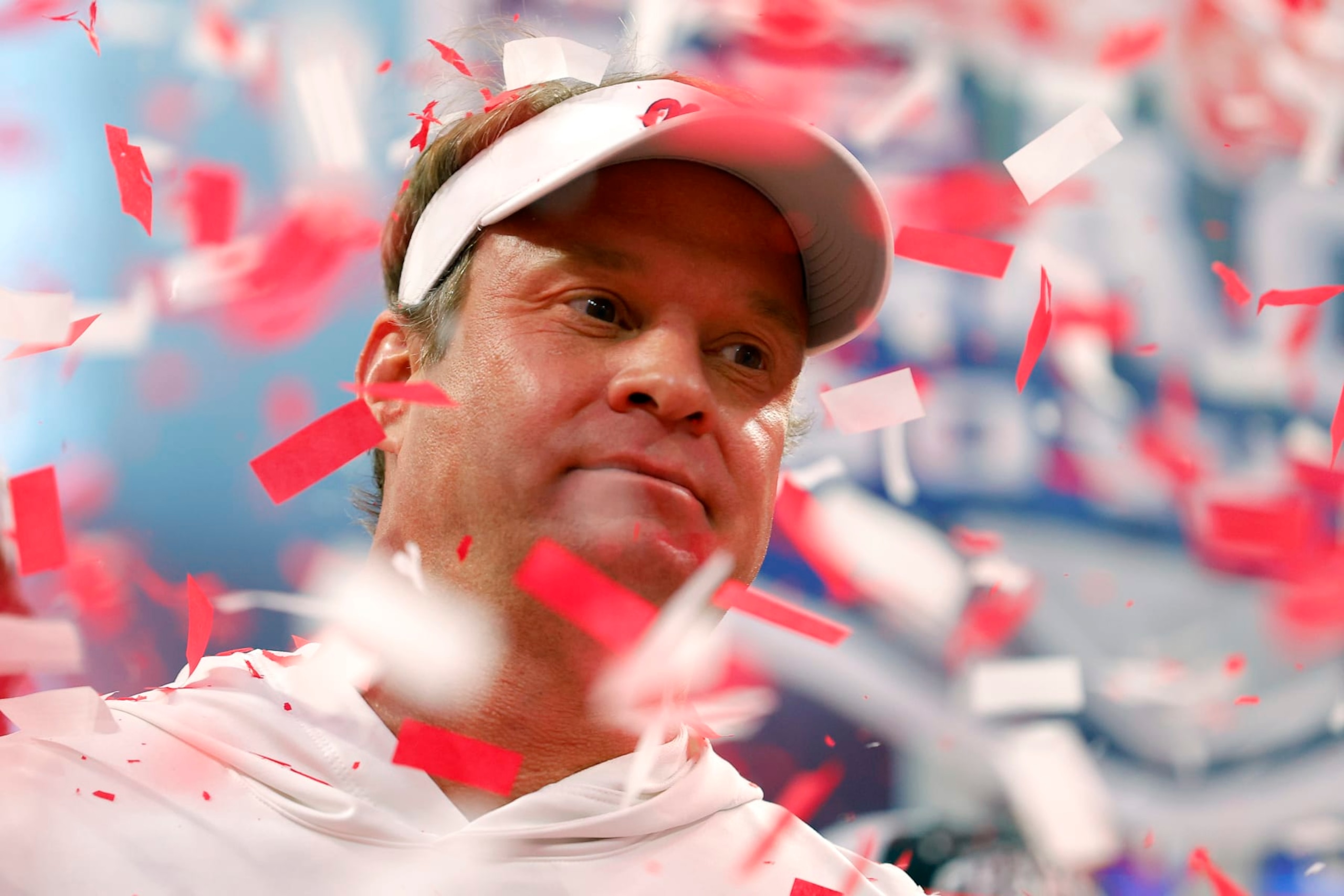 ATLANTA, GEORGIA - DECEMBER 30: Head coach Lane Kiffin of the Mississippi Rebels celebrates with the team after beating Penn State Nittany Lions during the Chick-fil-A Peach Bowl at Mercedes-Benz Stadium on December 30, 2023 in Atlanta, Georgia. (Photo by Todd Kirkland/Getty Images)