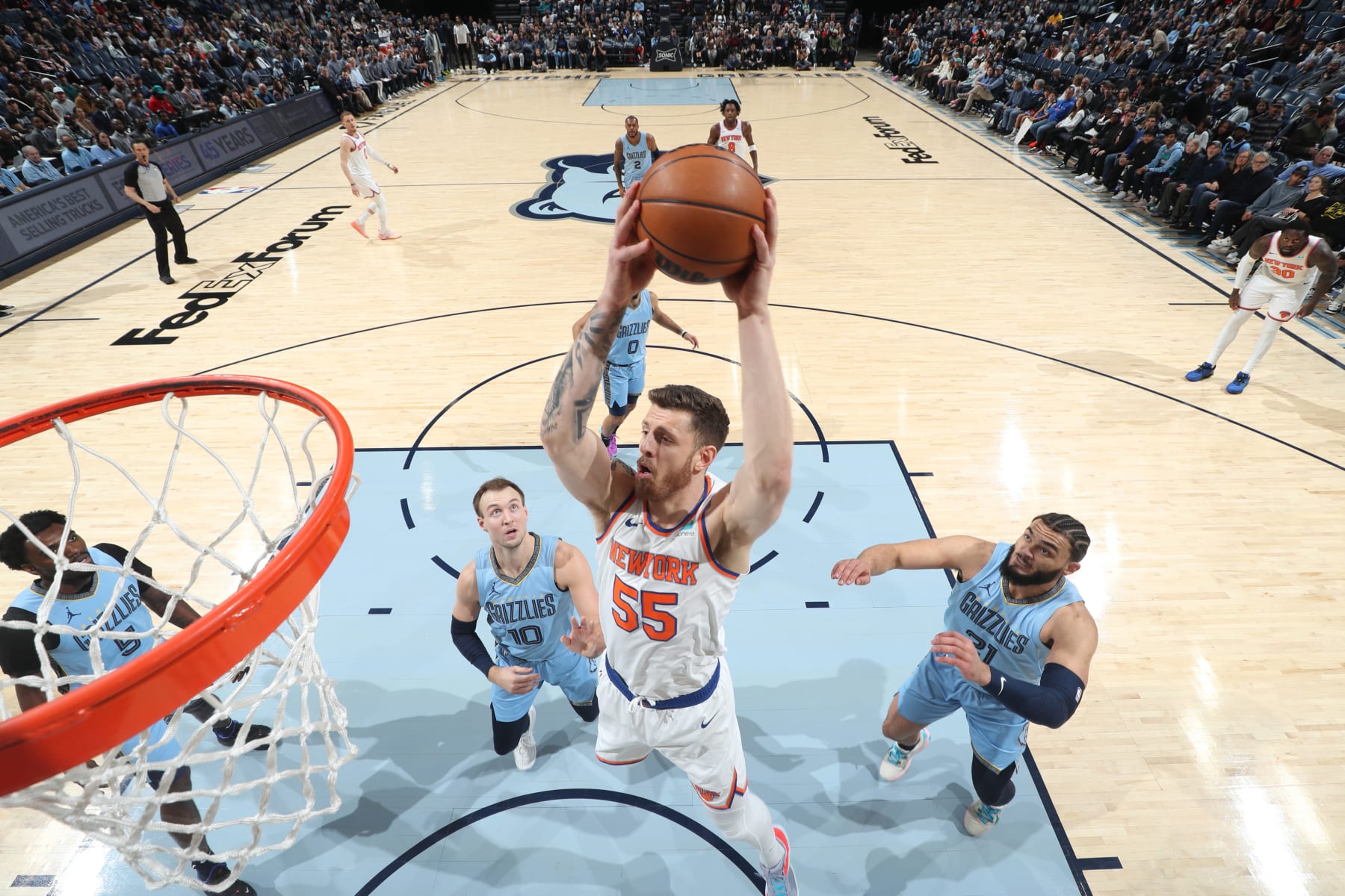 MEMPHIS, TN - JANUARY 13: Isaiah Hartenstein #55 of the New York Knicks drives to the basket during the game against the Memphis Grizzlies on January 13, 2024 at FedExForum in Memphis, Tennessee. NOTE TO USER: User expressly acknowledges and agrees that, by downloading and or using this photograph, User is consenting to the terms and conditions of the Getty Images License Agreement. Mandatory Copyright Notice: Copyright 2024 NBAE (Photo by Joe Murphy/NBAE via Getty Images)