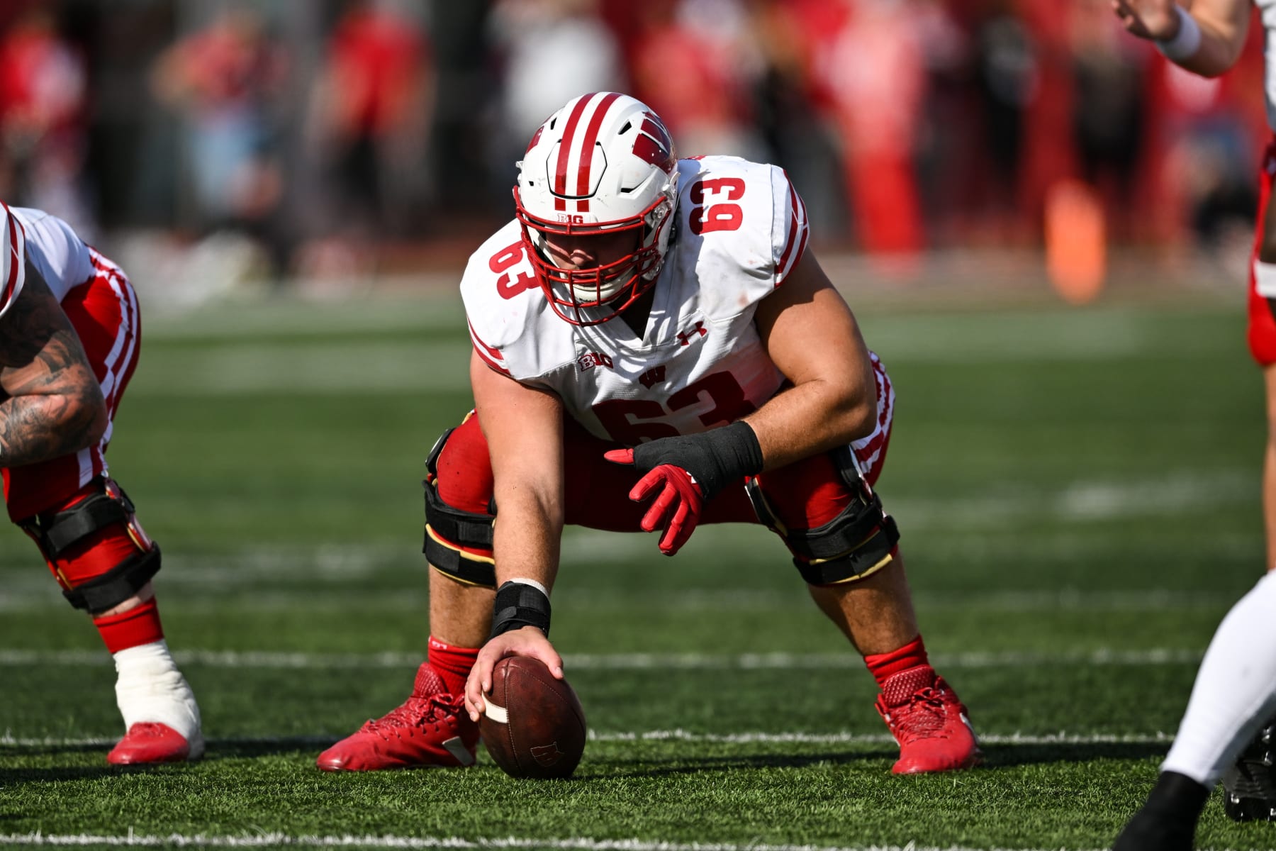 BLOOMINGTON, IN - NOVEMBER 04: Wisconsin OL Tanor Bortolini (63) during a college football game between the Wisconsin Badgers and Indiana Hoosiers on November 4, 2023 at Memorial Stadium in Bloomington, IN. (Photo by James Black/Icon Sportswire via Getty Images)