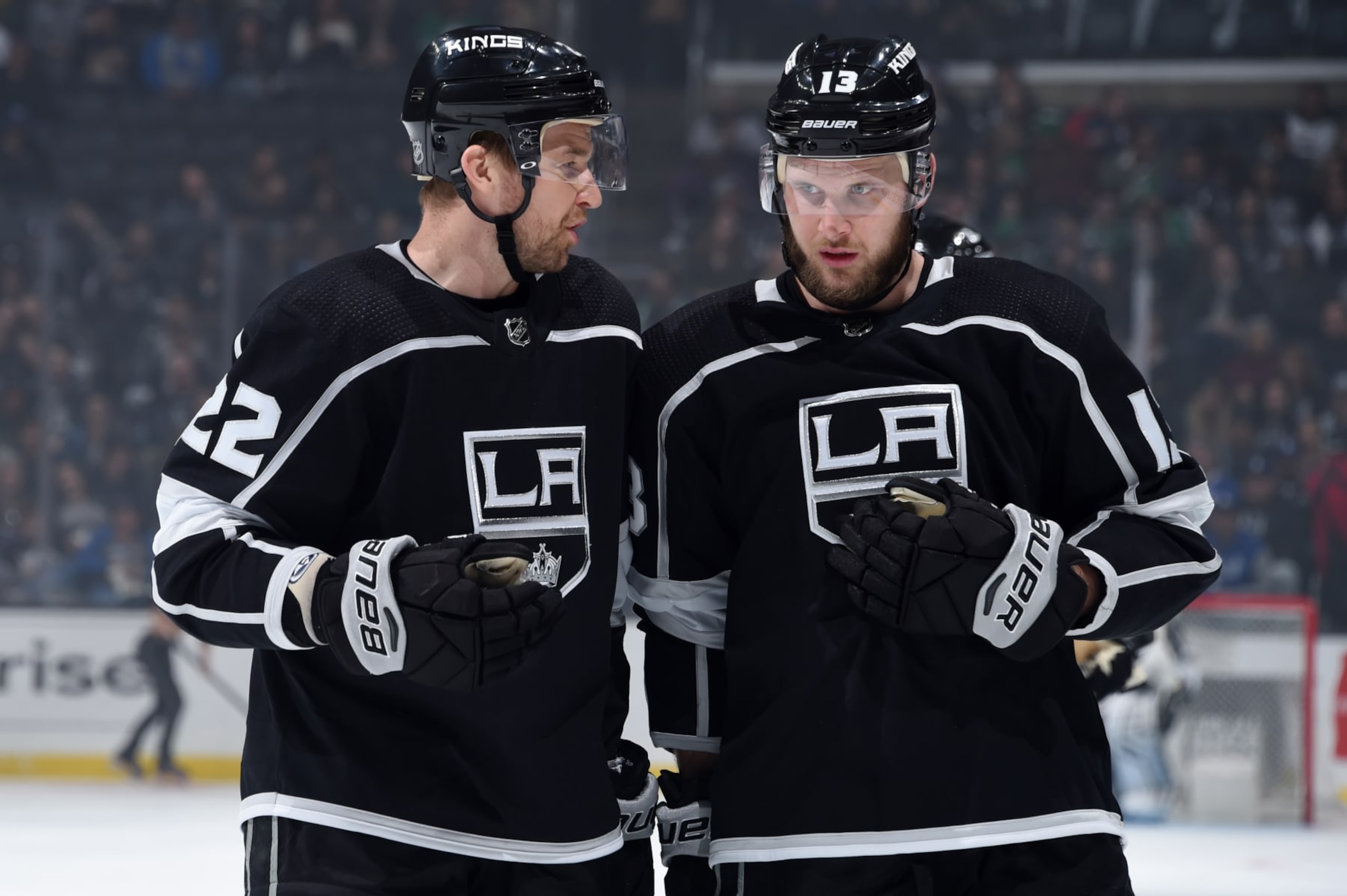 LOS ANGELES, CA - FEBRUARY 28: Trevor Lewis #22 and Kyle Clifford #13 of the Los Angeles Kings talk while waiting for play to resume during the first period of the game against the Dallas Stars at STAPLES Center on February 28, 2019 in Los Angeles, California. It was Lewis' 600th NHL career game. (Photo by Adam Pantozzi/NHLI via Getty Images) 
