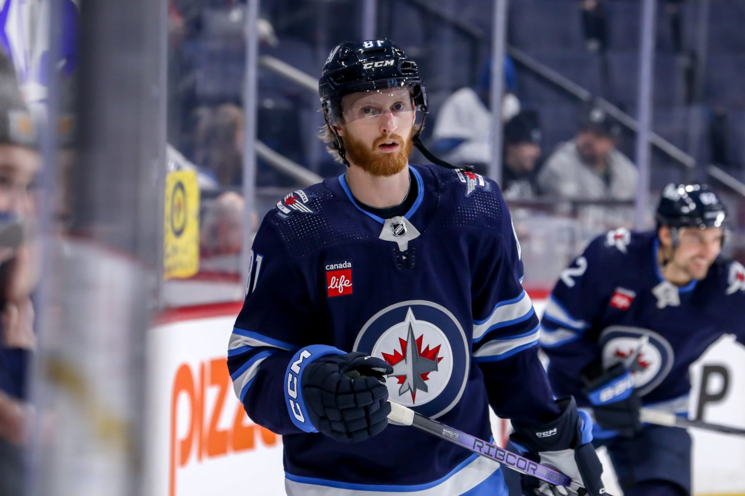 WINNIPEG, CANADA - JANUARY 16: Kyle Connor #81 of the Winnipeg Jets takes part in the pre-game warm up prior to NHL action against the New York Islanders at the Canada Life Centre on January 16, 2024 in Winnipeg, Manitoba, Canada. (Photo by Darcy Finley/NHLI via Getty Images)
