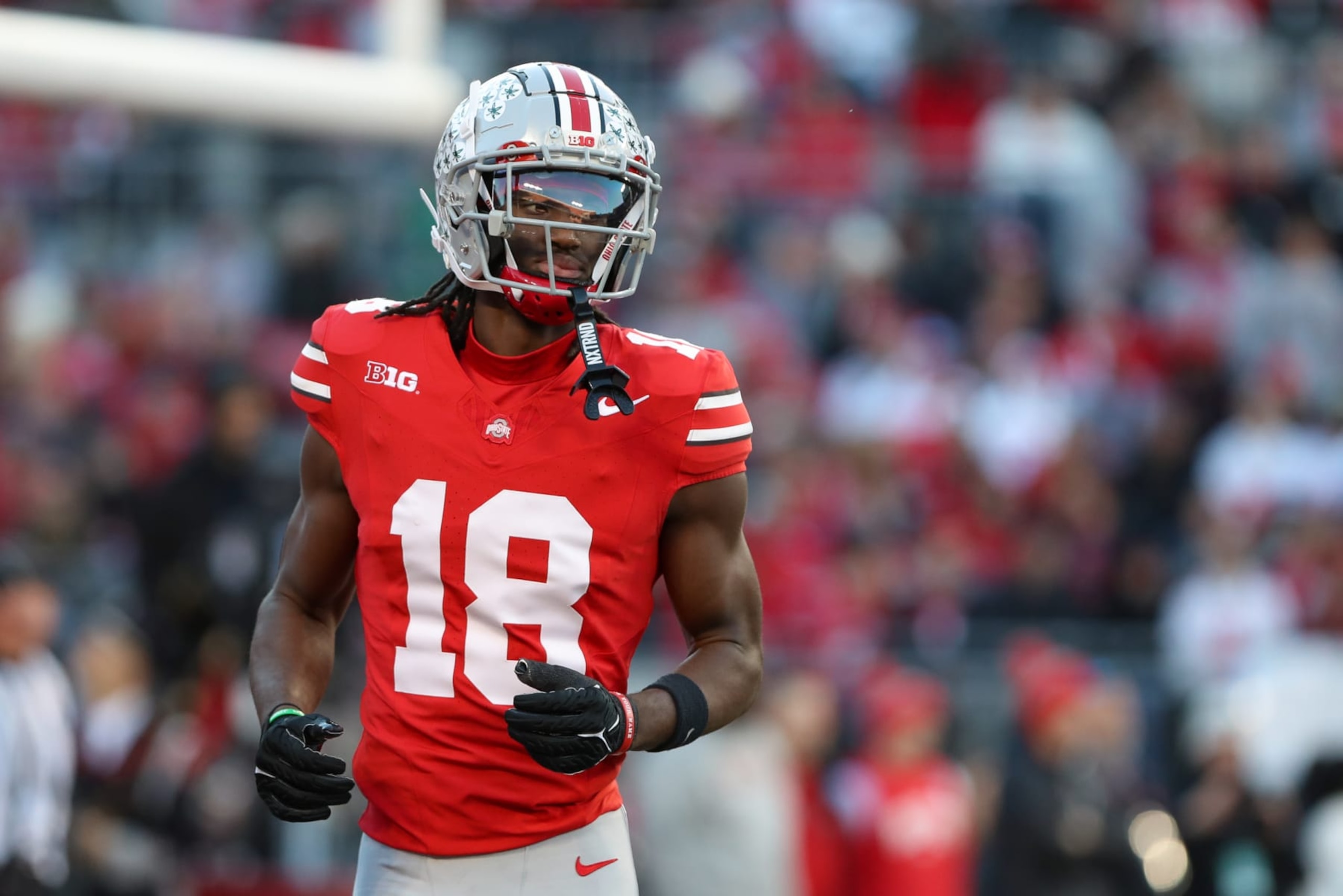 COLUMBUS, OH - NOVEMBER 18: Ohio State Buckeyes wide receiver Marvin Harrison Jr. (18) lines up for a play during the game against the Minnesota Golden Gophers and the Ohio State Buckeyes on November 18, 2023, at Ohio Stadium in Columbus, OH. (Photo by Ian Johnson/Icon Sportswire via Getty Images) COLUMBUS, OH - NOVEMBER 18: Ohio State Buckeyes wide receiver Marvin Harrison Jr. (18) lines up for a play during the game against the Minnesota Golden Gophers and the Ohio State Buckeyes on November 18, 2023, at Ohio Stadium in Columbus, OH. (Photo by Ian Johnson/Icon Sportswire via Getty Images)