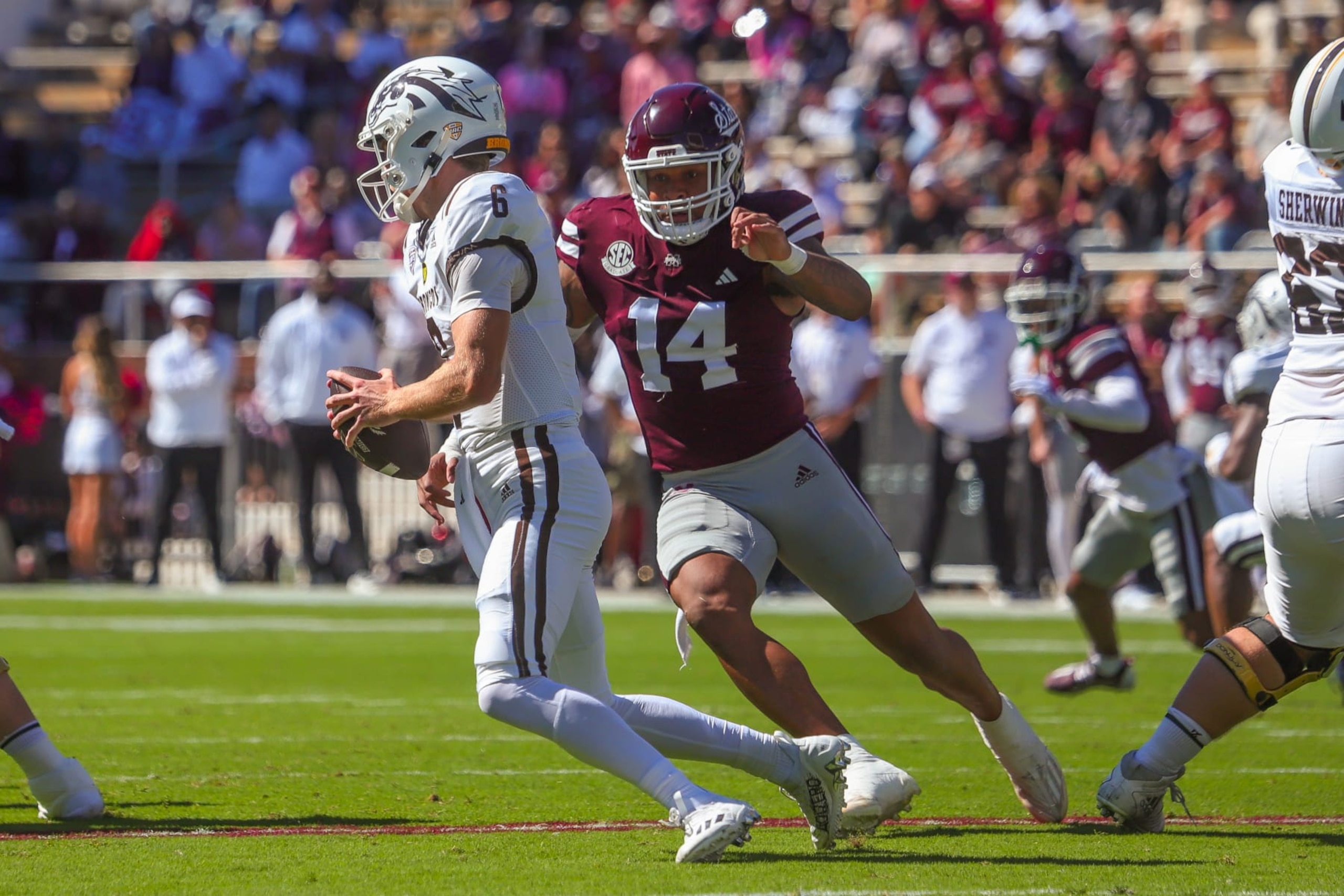 STARKVILLE, MS - OCTOBER 07: Mississippi State Bulldogs linebacker Nathaniel Watson (14) chases Western Michigan Broncos quarterback Jack Salopek (6) during the game between the Western Michigan Broncos and the Mississippi State Bulldogs on October 7, 2023 at Davis Wade Stadium at Scott Field in Starkville, MS. (Photo by Chris McDill/Icon Sportswire via Getty Images) STARKVILLE, MS - OCTOBER 07: Mississippi State Bulldogs linebacker Nathaniel Watson (14) chases Western Michigan Broncos quarterback Jack Salopek (6) during the game between the Western Michigan Broncos and the Mississippi State Bulldogs on October 7, 2023 at Davis Wade Stadium at Scott Field in Starkville, MS. (Photo by Chris McDill/Icon Sportswire via Getty Images)