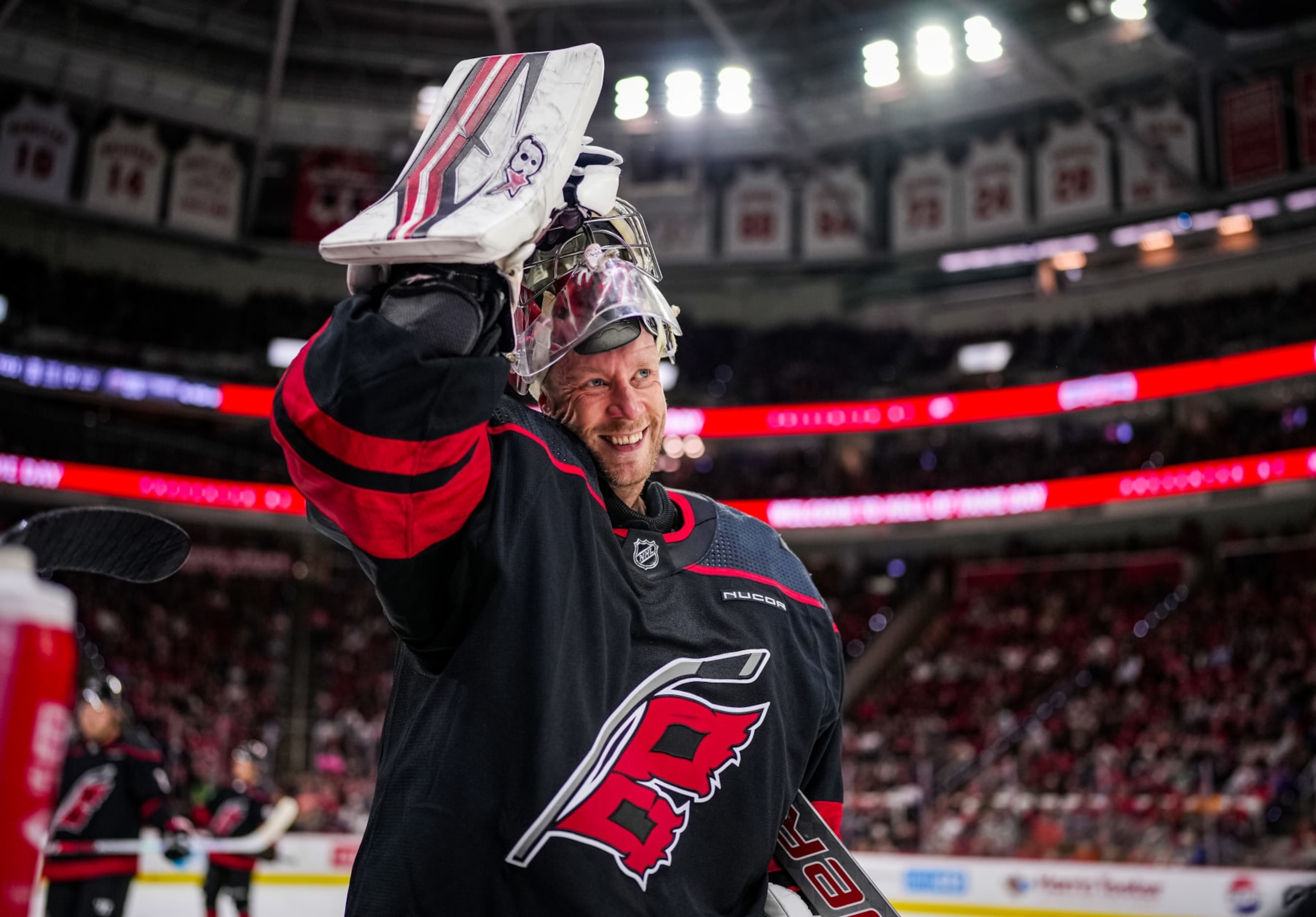 RALEIGH, NORTH CAROLINA - JANUARY 15: Antti Raanta #32 of the Carolina Hurricanes reacts during the second period against the Los Angeles Kings at PNC Arena on January 15, 2024 in Raleigh, North Carolina. (Photo by Josh Lavallee/NHLI via Getty Images)
