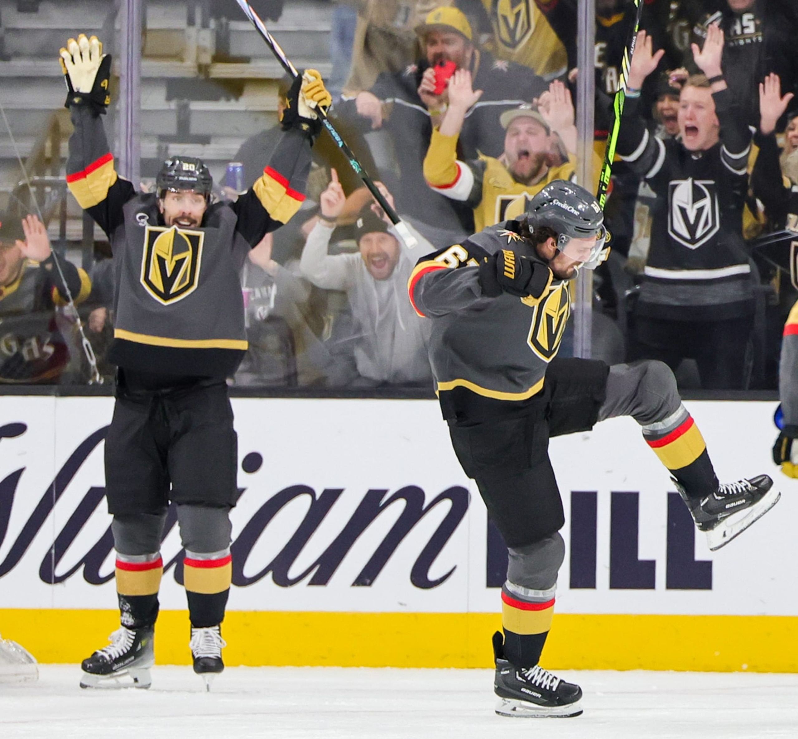 LAS VEGAS, NEVADA - JANUARY 15: Chandler Stephenson (L) #20 and Mark Stone #61 of the Vegas Golden Knights celebrate after Stone scored a goal against the Nashville Predators in the first period of their game at T-Mobile Arena on January 15, 2024 in Las Vegas, Nevada. (Photo by Ethan Miller/Getty Images)