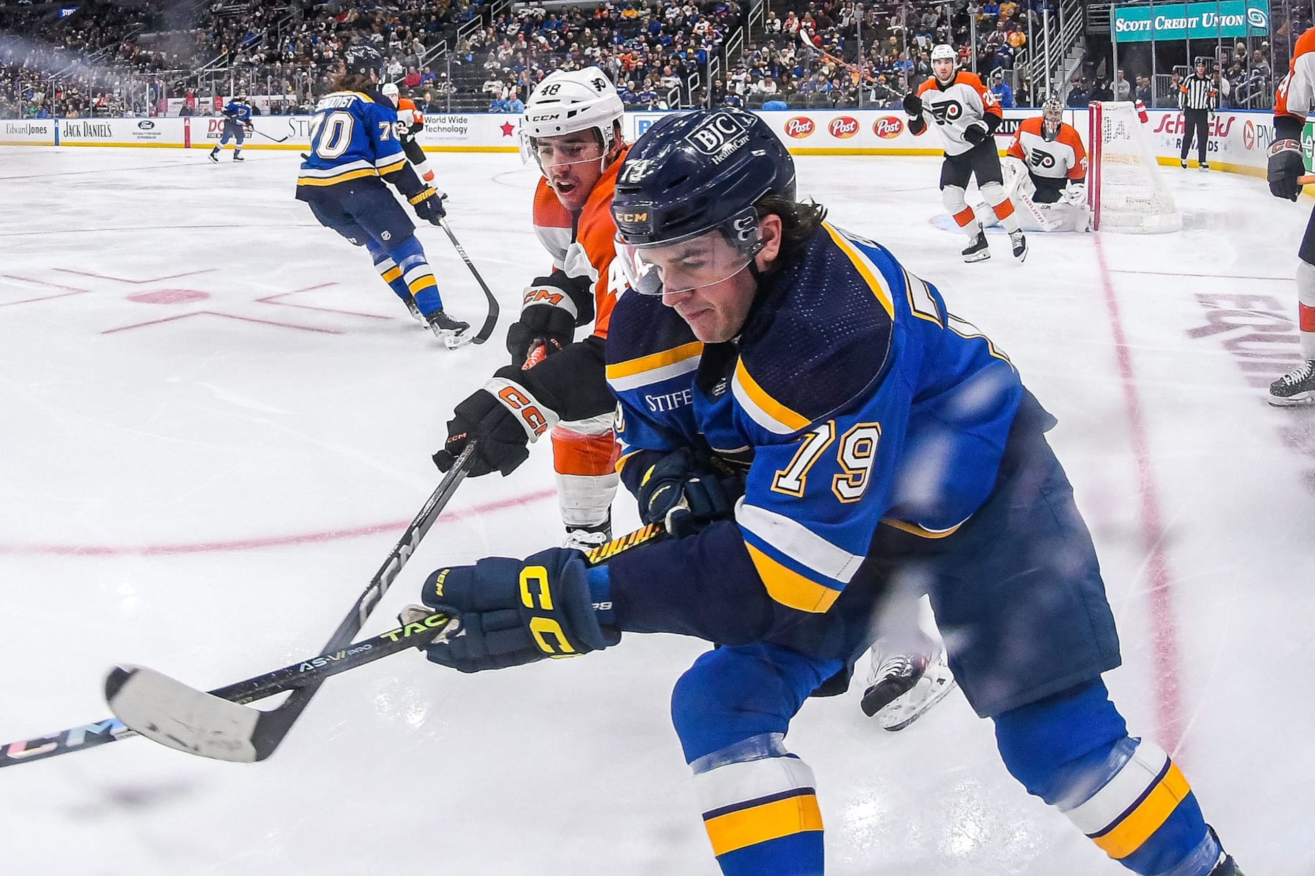 ST. LOUIS, MO - JANUARY 15: Morgan Frost #48 of the Philadelphia Flyers defends against Sammy Blais #79 of the St. Louis Blues on January 15, 2024 at the Enterprise Center in St. Louis, Missouri. (Photo by Scott Rovak/NHLI via Getty Images) 