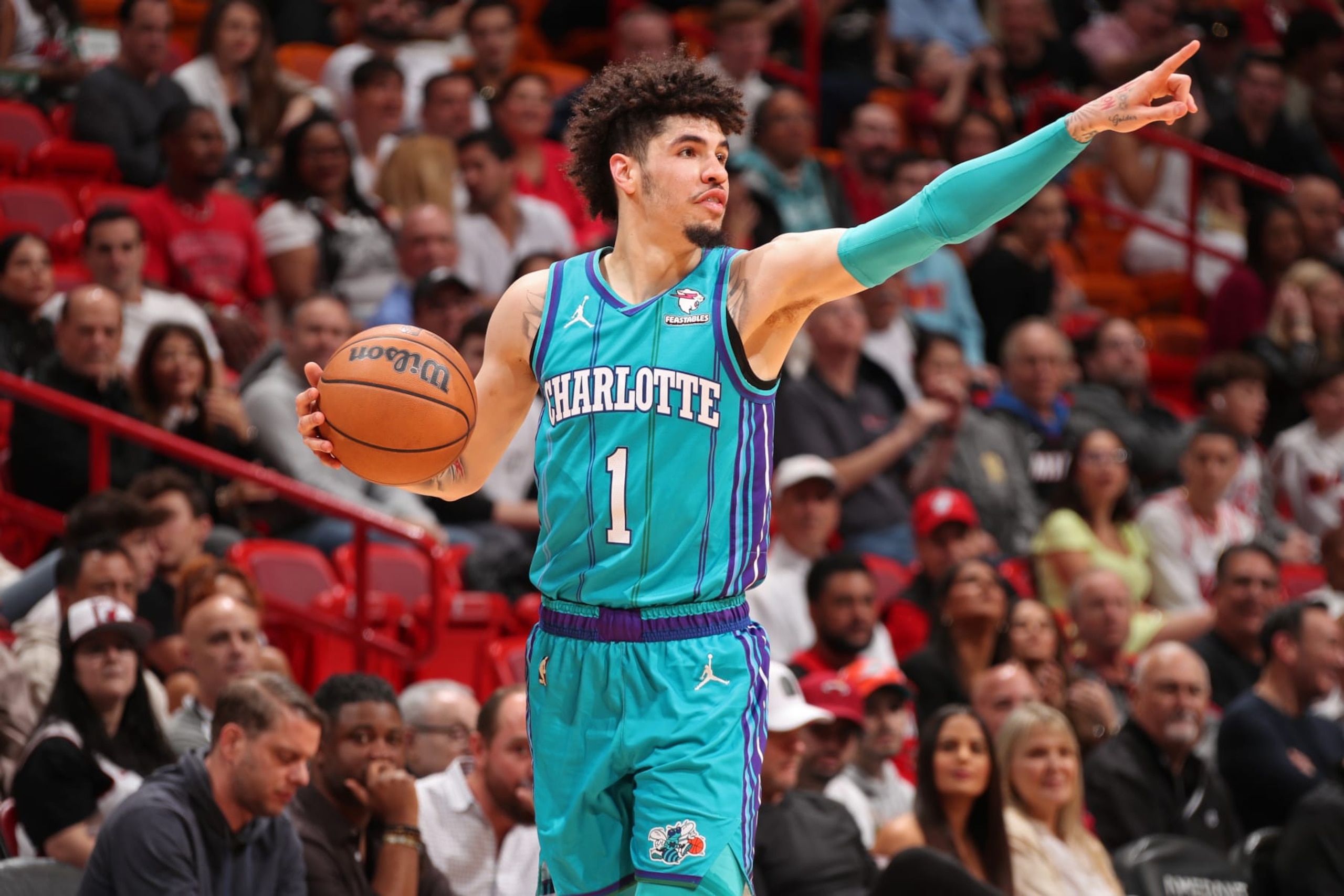MIAMI, FL - JANUARY 14: LaMelo Ball #1 of the Charlotte Hornets signals during the game against the Miami Heat on January 14, 2024 at Kaseya Center in Miami, Florida. NOTE TO USER: User expressly acknowledges and agrees that, by downloading and or using this Photograph, user is consenting to the terms and conditions of the Getty Images License Agreement. Mandatory Copyright Notice: Copyright 2024 NBAE (Photo by Issac Baldizon/NBAE via Getty Images) MIAMI, FL - JANUARY 14: LaMelo Ball #1 of the Charlotte Hornets signals during the game against the Miami Heat on January 14, 2024 at Kaseya Center in Miami, Florida. NOTE TO USER: User expressly acknowledges and agrees that, by downloading and or using this Photograph, user is consenting to the terms and conditions of the Getty Images License Agreement. Mandatory Copyright Notice: Copyright 2024 NBAE (Photo by Issac Baldizon/NBAE via Getty Images)