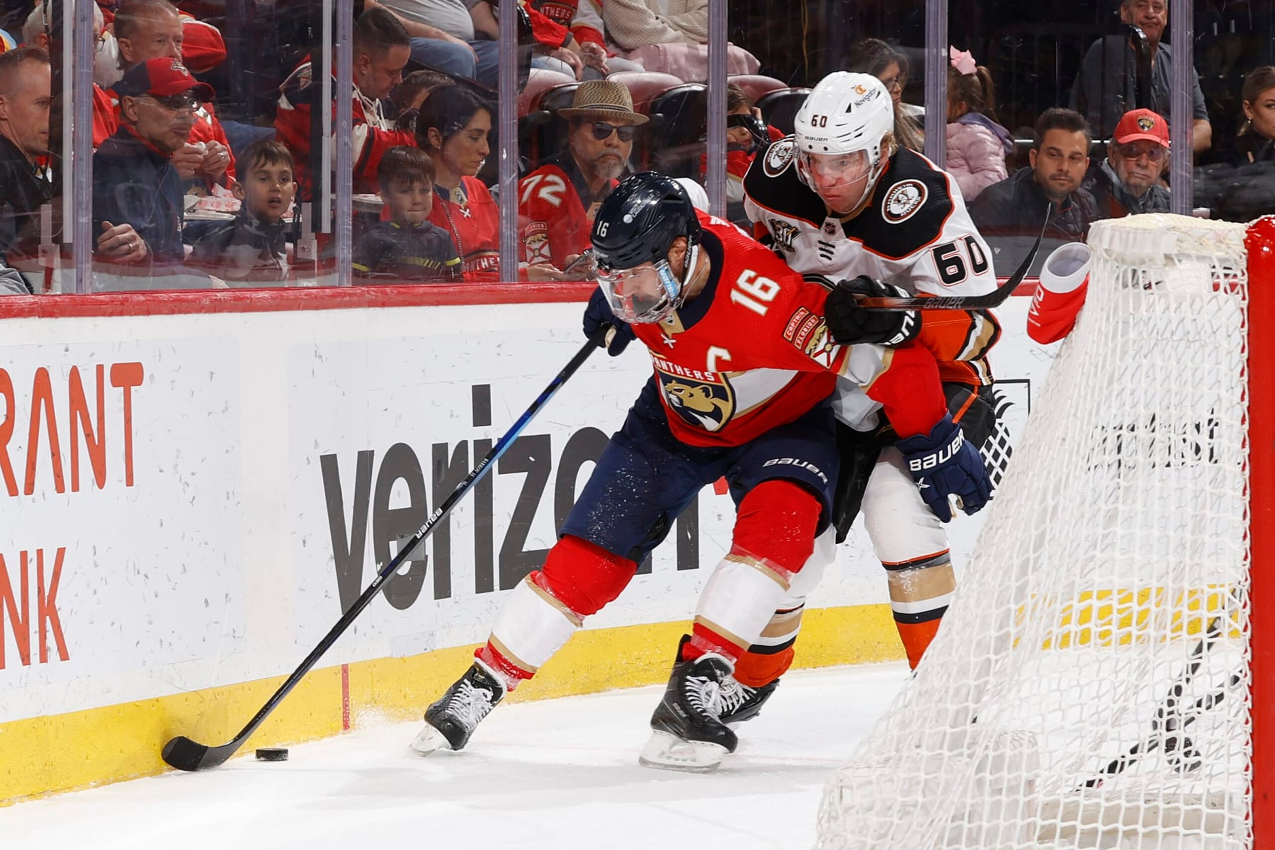 SUNRISE, FL - JANUARY 15: Jackson LaCombe #60 of the Anaheim Ducks defendds against Aleksander Barkov #16 of the Florida Panthers during first period action at the Amerant Bank Arena on January 15, 2024 in Sunrise, Florida. (Photo by Joel Auerbach/Getty Images)