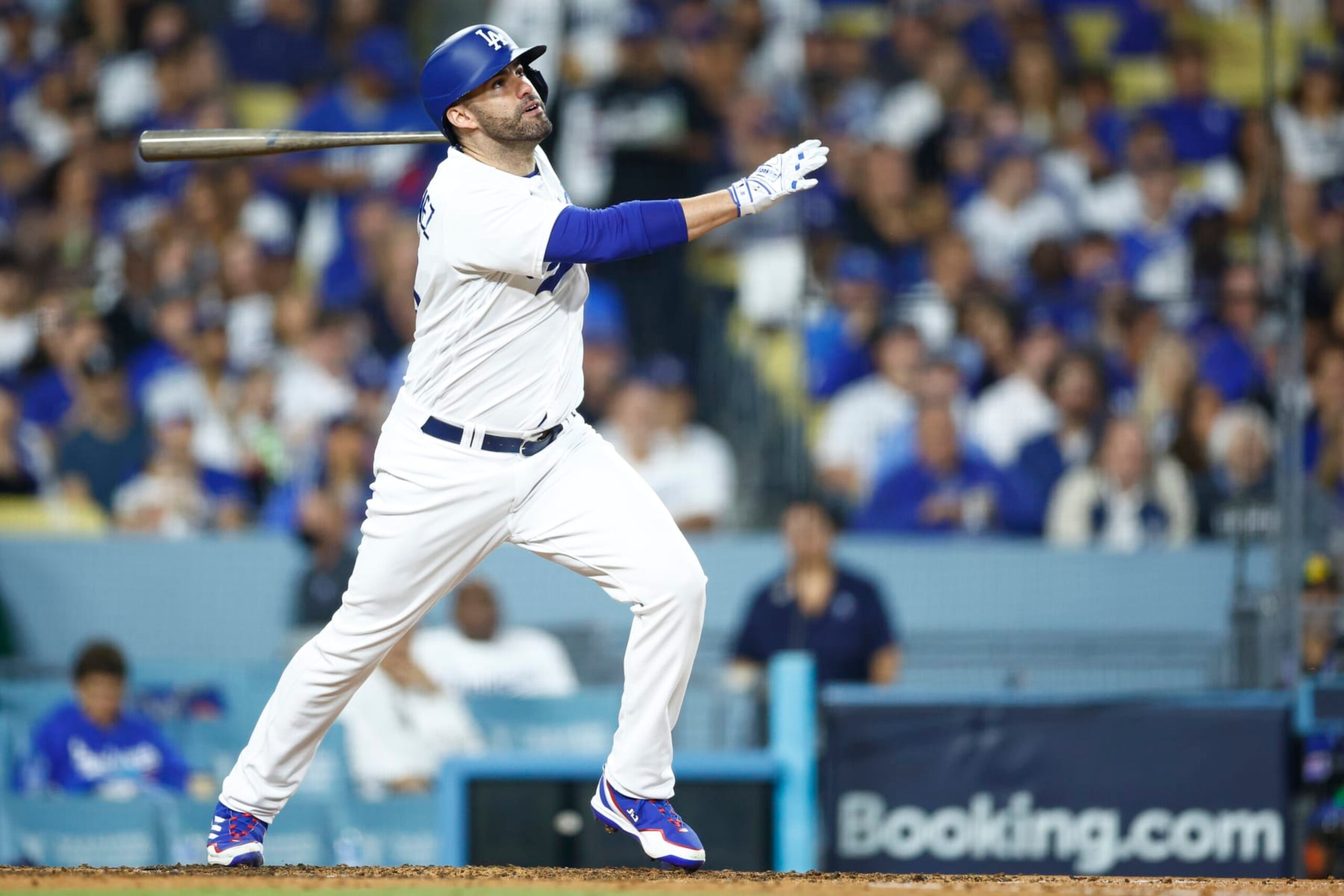 LOS ANGELES, CALIFORNIA - OCTOBER 09: J.D. Martinez #28 of the Los Angeles Dodgers hits a solo home run against the Arizona Diamondbacks during the fourth inning in Game Two of the Division Series at Dodger Stadium on October 09, 2023 in Los Angeles, California. (Photo by Ronald Martinez/Getty Images)