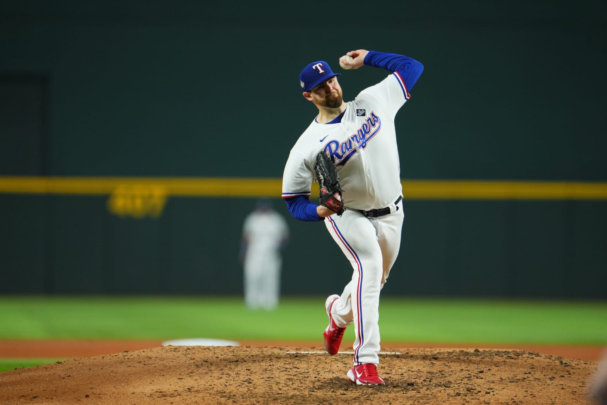 ARLINGTON, TX - OCTOBER 28: Jordan Montgomery #52 of the Texas Rangers pitches during Game 2 of the 2023 World Series between the Arizona Diamondbacks and the Texas Rangers at Globe Life Field on Saturday, October 28, 2023 in Arlington, Texas. (Photo by Cooper Neill/MLB Photos via Getty Images)