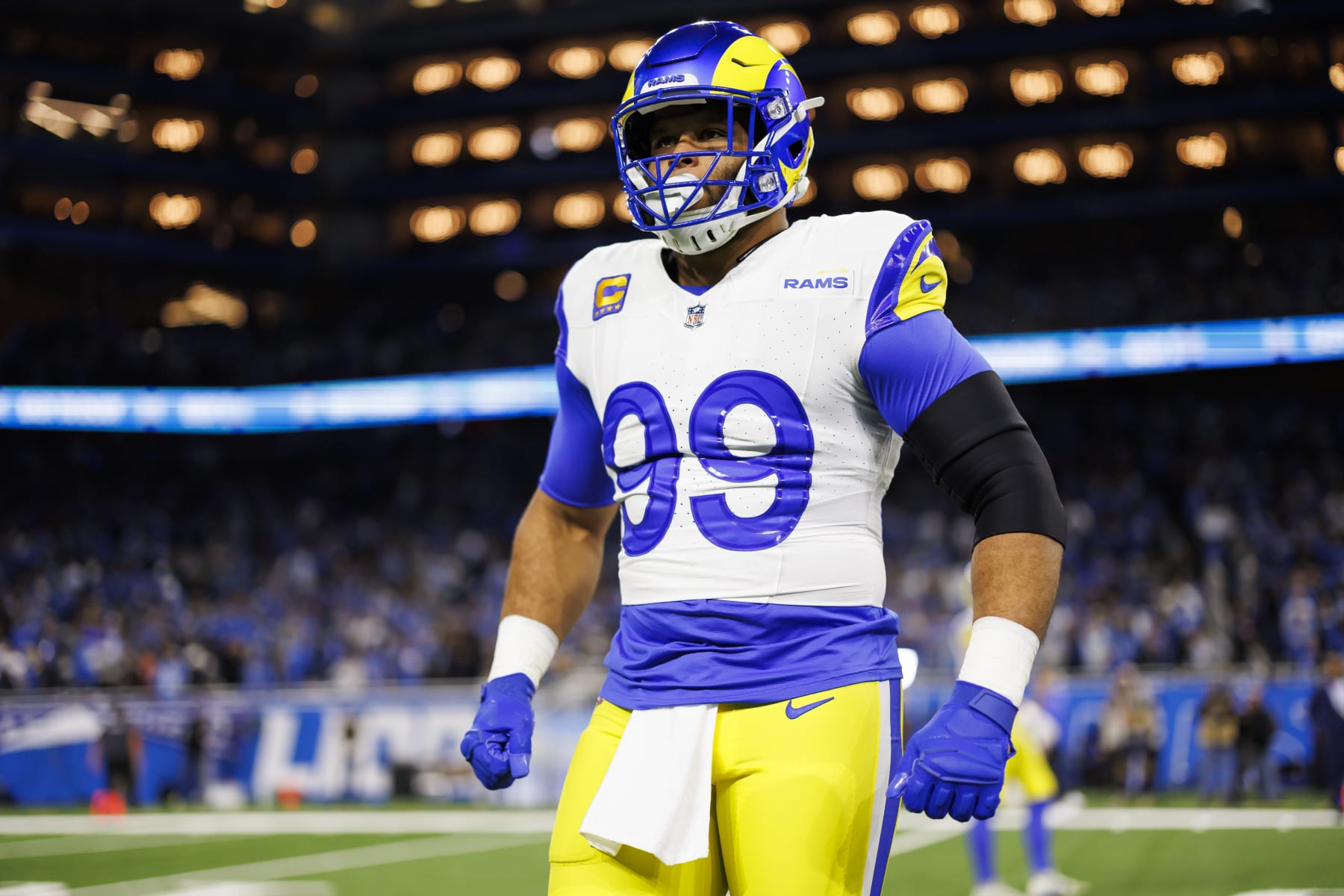 DETROIT, MICHIGAN - JANUARY 14: Aaron Donald #99 of the Los Angeles Rams reacts during pregame warmups prior to an NFC Wild Card Playoff football game against the Detroit Lions at Ford Field on January 14, 2024 in Detroit, Michigan. (Photo by Ryan Kang/Getty Images)