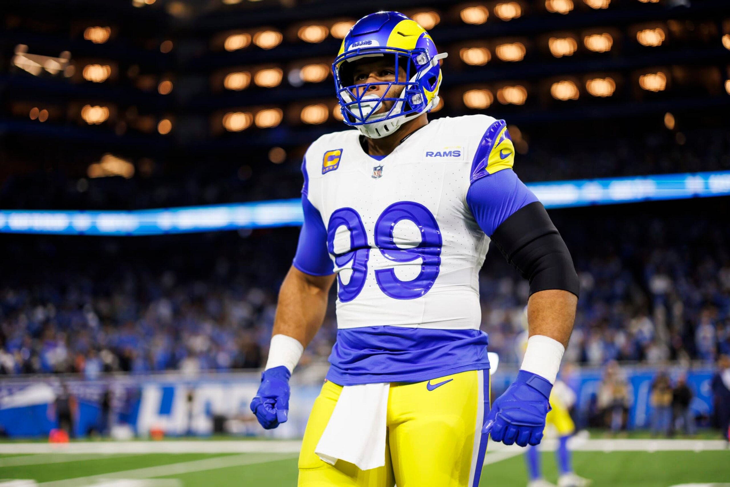 DETROIT, MICHIGAN - JANUARY 14: Aaron Donald #99 of the Los Angeles Rams reacts during pregame warmups prior to an NFC Wild Card Playoff football game against the Detroit Lions at Ford Field on January 14, 2024 in Detroit, Michigan. (Photo by Ryan Kang/Getty Images)