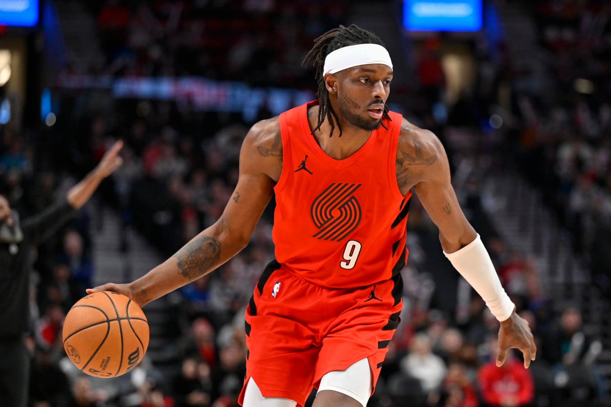 PORTLAND, OREGON - JANUARY 17: Jerami Grant #9 of the Portland Trail Blazers dribbles during the fourth quarter against the Brooklyn Nets at the Moda Center on January 17, 2024 in Portland, Oregon. The Portland Trail Blazers won 105-103. NOTE TO USER: User expressly acknowledges and agrees that, by downloading and or using this photograph, User is consenting to the terms and conditions of the Getty Images License Agreement. (Photo by Alika Jenner/Getty Images)