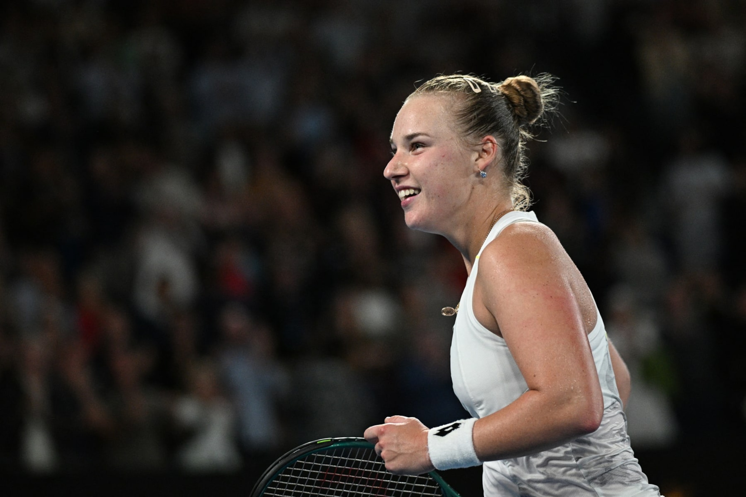 Russia's Anna Blinkova celebrates after victory against Kazakhstan's Elena Rybakina in their women's singles match on day five of the Australian Open tennis tournament in Melbourne on January 18, 2024. (Photo by Anthony WALLACE / AFP) / -- IMAGE RESTRICTED TO EDITORIAL USE - STRICTLY NO COMMERCIAL USE -- (Photo by ANTHONY WALLACE/AFP via Getty Images)