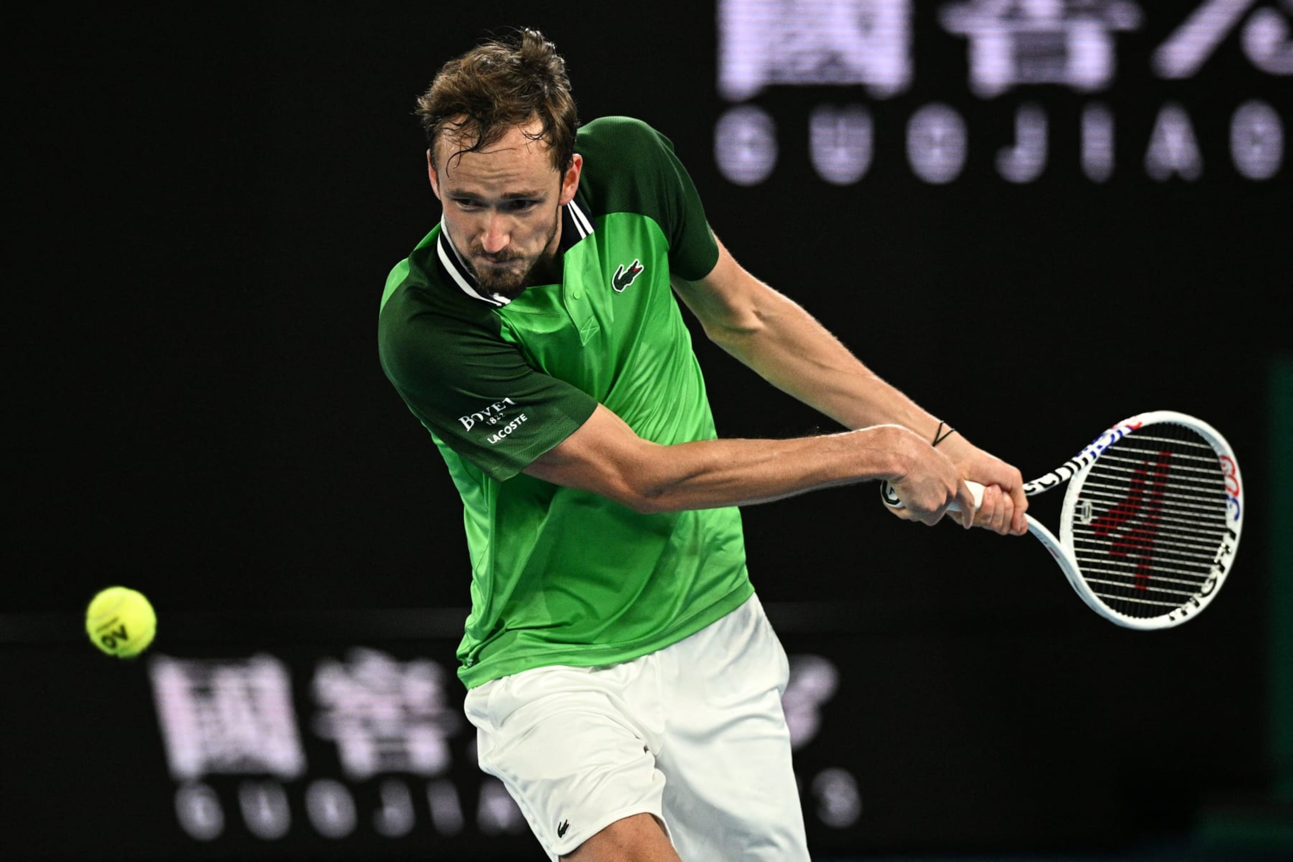 Russia's Daniil Medvedev hits a return against Finland's Emil Ruusuvuori during their men's singles match on day five of the Australian Open tennis tournament in Melbourne early on January 19, 2024. (Photo by Anthony WALLACE / AFP) / -- IMAGE RESTRICTED TO EDITORIAL USE - STRICTLY NO COMMERCIAL USE -- (Photo by ANTHONY WALLACE/AFP via Getty Images)
