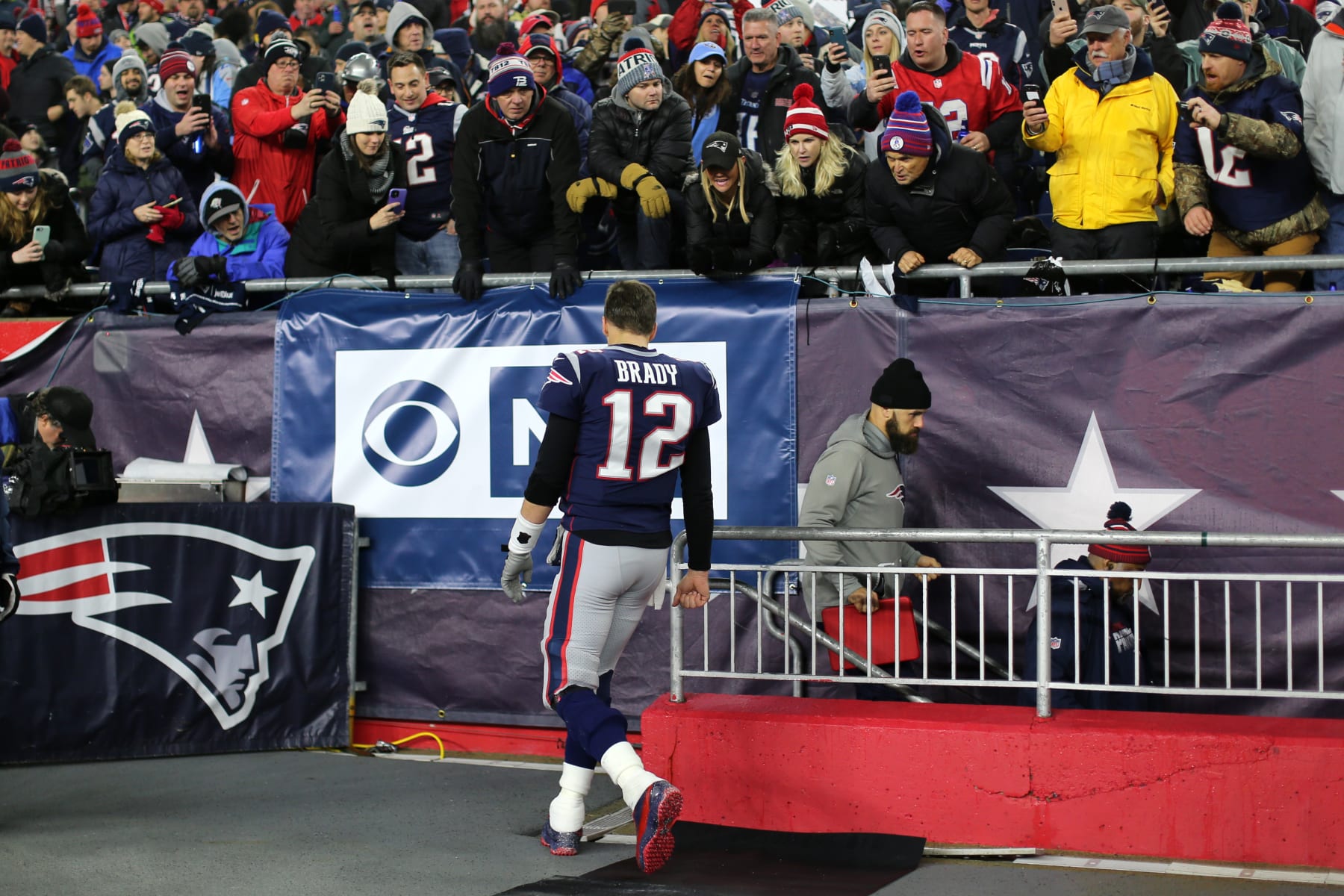 FOXBOROUGH, MASSACHUSETTS - JANUARY 04: Tom Brady #12 of the New England Patriots walks to the locker room during half time of the AFC Wild Card Playoff game at Gillette Stadium on January 04, 2020 in Foxborough, Massachusetts. (Photo by Maddie Meyer/Getty Images)