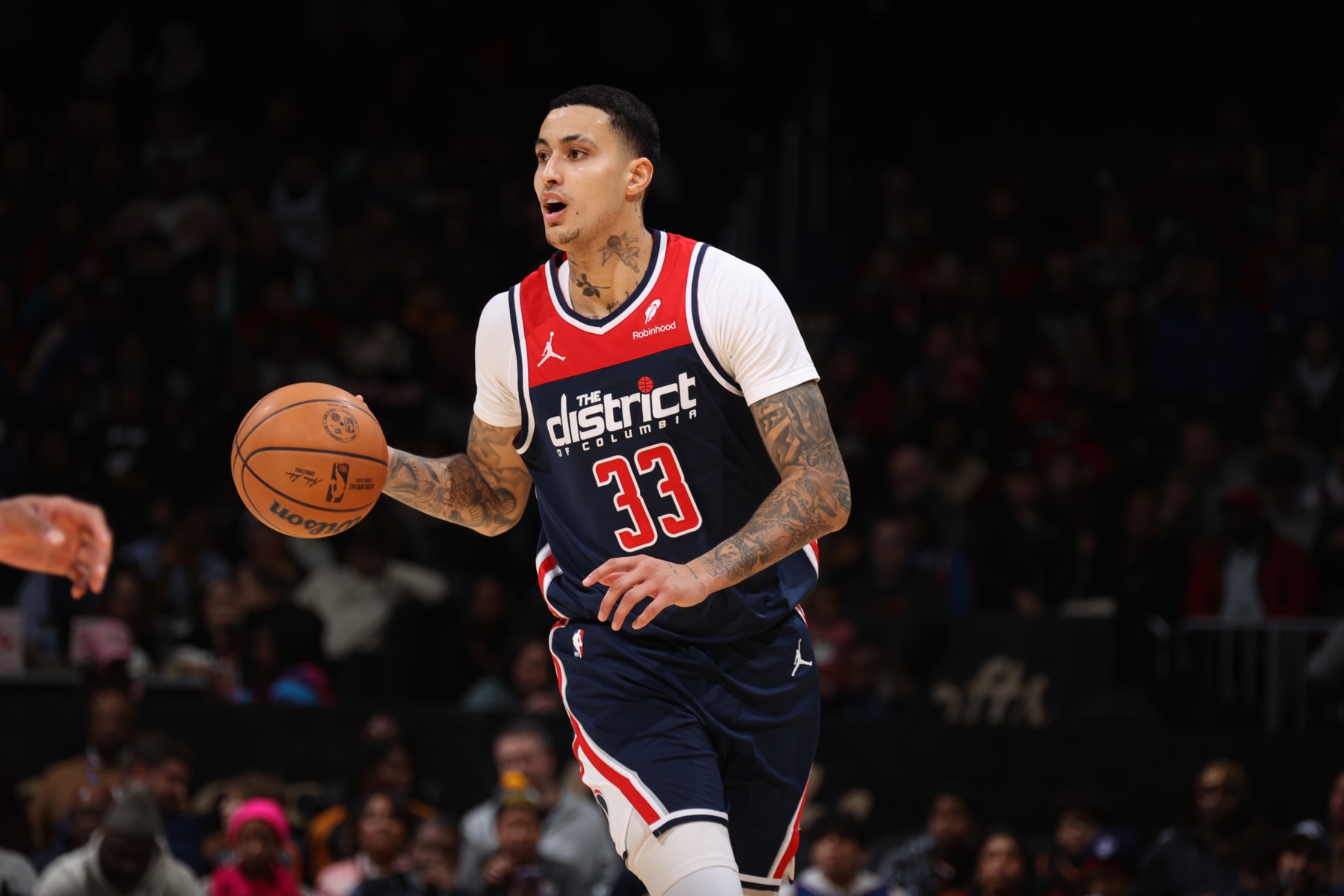 WASHINGTON, DC -  JANUARY 15: Kyle Kuzma #33 of the Washington Wizards dribbles the ball during the game against the Detroit Pistons on January 15, 2024 at Capital One Arena in Washington, DC. NOTE TO USER: User expressly acknowledges and agrees that, by downloading and or using this Photograph, user is consenting to the terms and conditions of the Getty Images License Agreement. Mandatory Copyright Notice: Copyright 2024 NBAE (Photo by Stephen Gosling/NBAE via Getty Images)