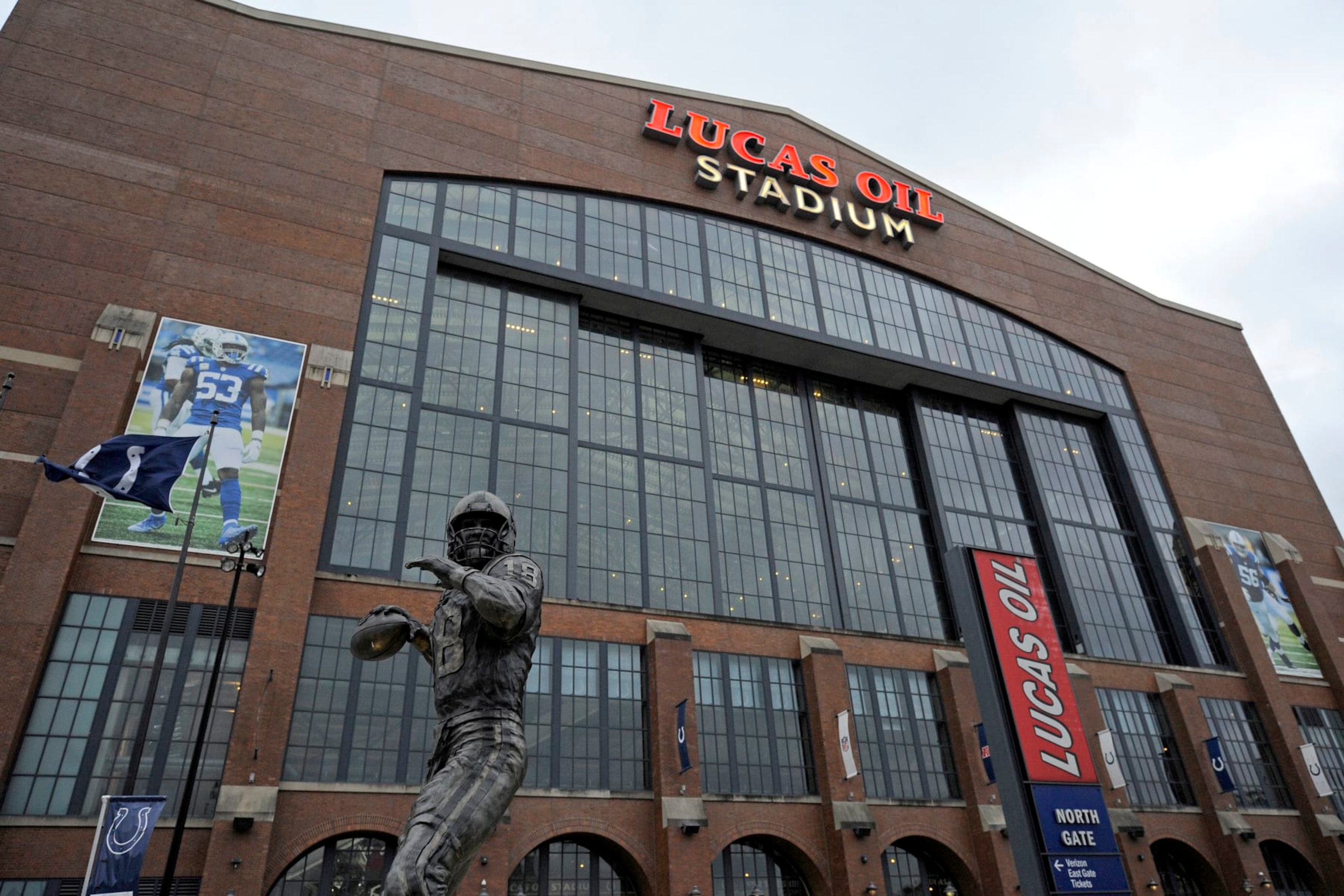 INDIANAPOLIS, IN - DECEMBER 18: A statue of Peyton Manning stands outside of the stadium before the start of the NFL football game between the New England Patriots and the Indianapolis Colts on December 18, 2021, at Lucas Oil Stadium in Indianapolis, Indiana. (Photo by Michael Allio/Icon Sportswire via Getty Images)