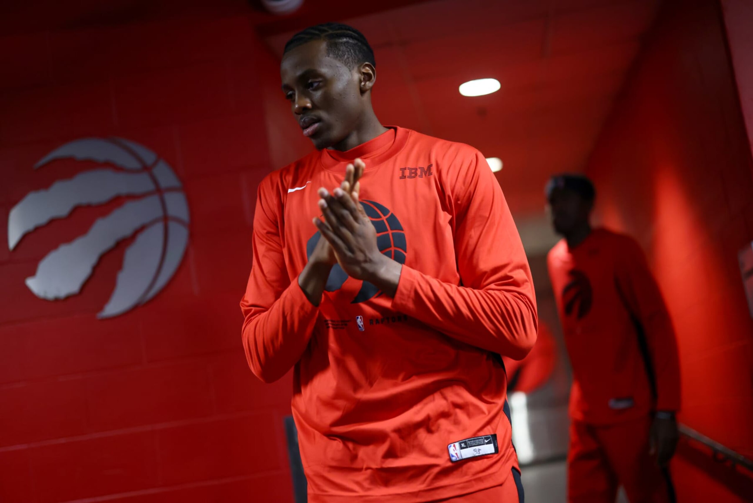 TORONTO, CANADA - APRIL 12: Christian Koloko #35 of the Toronto Raptors walks to the court before the game against the Chicago Bulls during the 2023 Play-In Tournament on April 12, 2023 at the Scotiabank Arena in Toronto, Ontario, Canada.  NOTE TO USER: User expressly acknowledges and agrees that, by downloading and or using this Photograph, user is consenting to the terms and conditions of the Getty Images License Agreement.  Mandatory Copyright Notice: Copyright 2023 NBAE (Photo by Vaughn Ridley/NBAE via Getty Images)