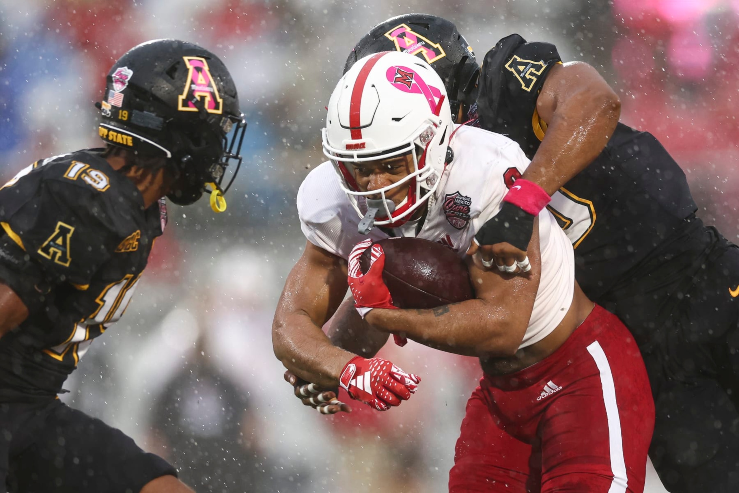 ORLANDO, FLORIDA - DECEMBER 16: Rashad Amos #0 of the Miami (Oh) Redhawks carries the ball during the first quarter of The Avocados From Mexico Cure Bowl against the Appalachian State Mountaineers at FBC Mortgage Stadium on December 16, 2023 in Orlando, Florida. (Photo by Kevin Sabitus/Getty Images)
