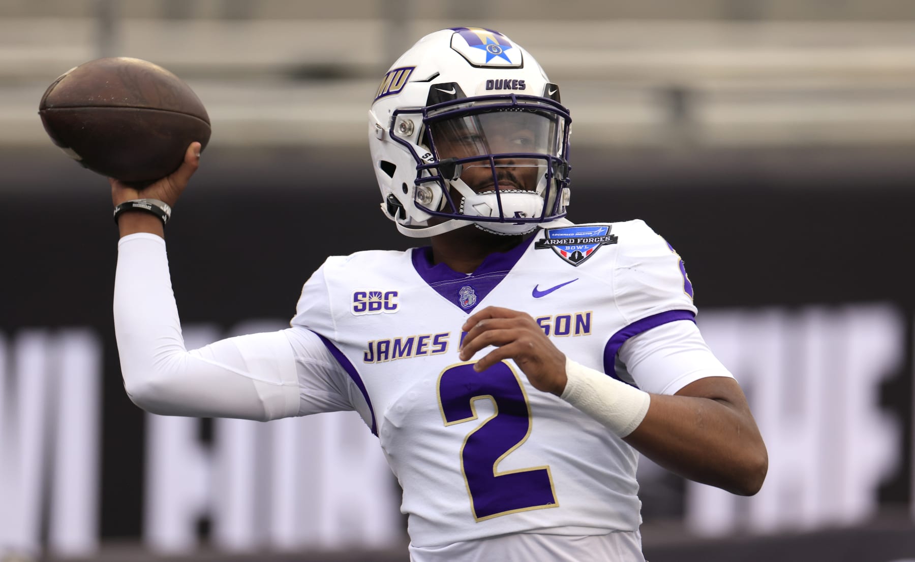 FORT WORTH, TX - DECEMBER 23: Quarterback Jordan McCloud #2 of the James Madison Dukes warms up before the playing against the Air Force Falcons in the Lockheed Martin Armed Forces Bowl at Amon G. Carter Stadium on December 23, 2023 in Fort Worth, Texas. (Photo by Ron Jenkins/Getty Images)