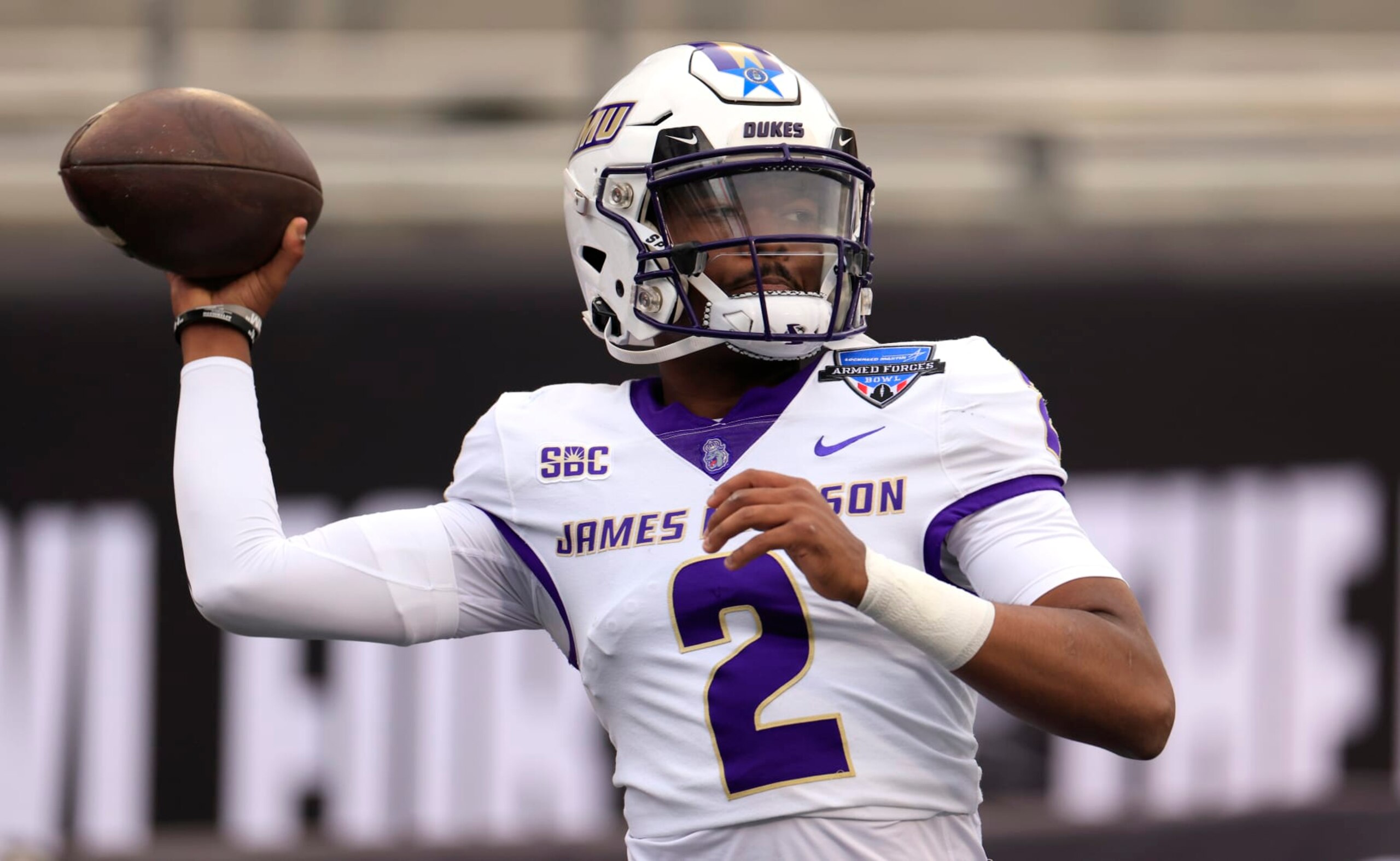 FORT WORTH, TX - DECEMBER 23: Quarterback Jordan McCloud #2 of the James Madison Dukes warms up before the playing against the Air Force Falcons in the Lockheed Martin Armed Forces Bowl at Amon G. Carter Stadium on December 23, 2023 in Fort Worth, Texas. (Photo by Ron Jenkins/Getty Images)