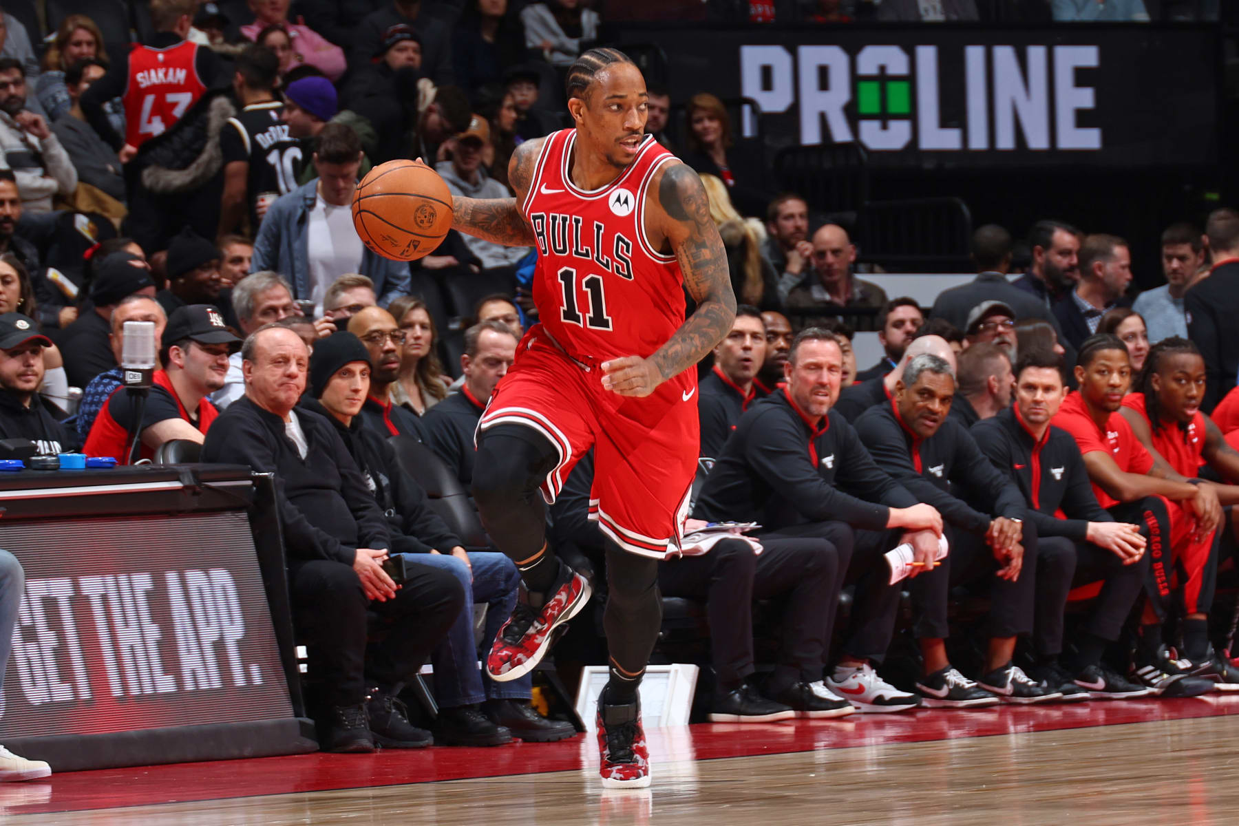 TORONTO, CANADA - JANUARY 18: DeMar DeRozan #11 of the Chicago Bulls dribbles the ball during the game against the Toronto Raptors on January 18, 2024 at the Scotiabank Arena in Toronto, Ontario, Canada.  NOTE TO USER: User expressly acknowledges and agrees that, by downloading and or using this Photograph, user is consenting to the terms and conditions of the Getty Images License Agreement.  Mandatory Copyright Notice: Copyright 2024 NBAE (Photo by Vaughn Ridley/NBAE via Getty Images)