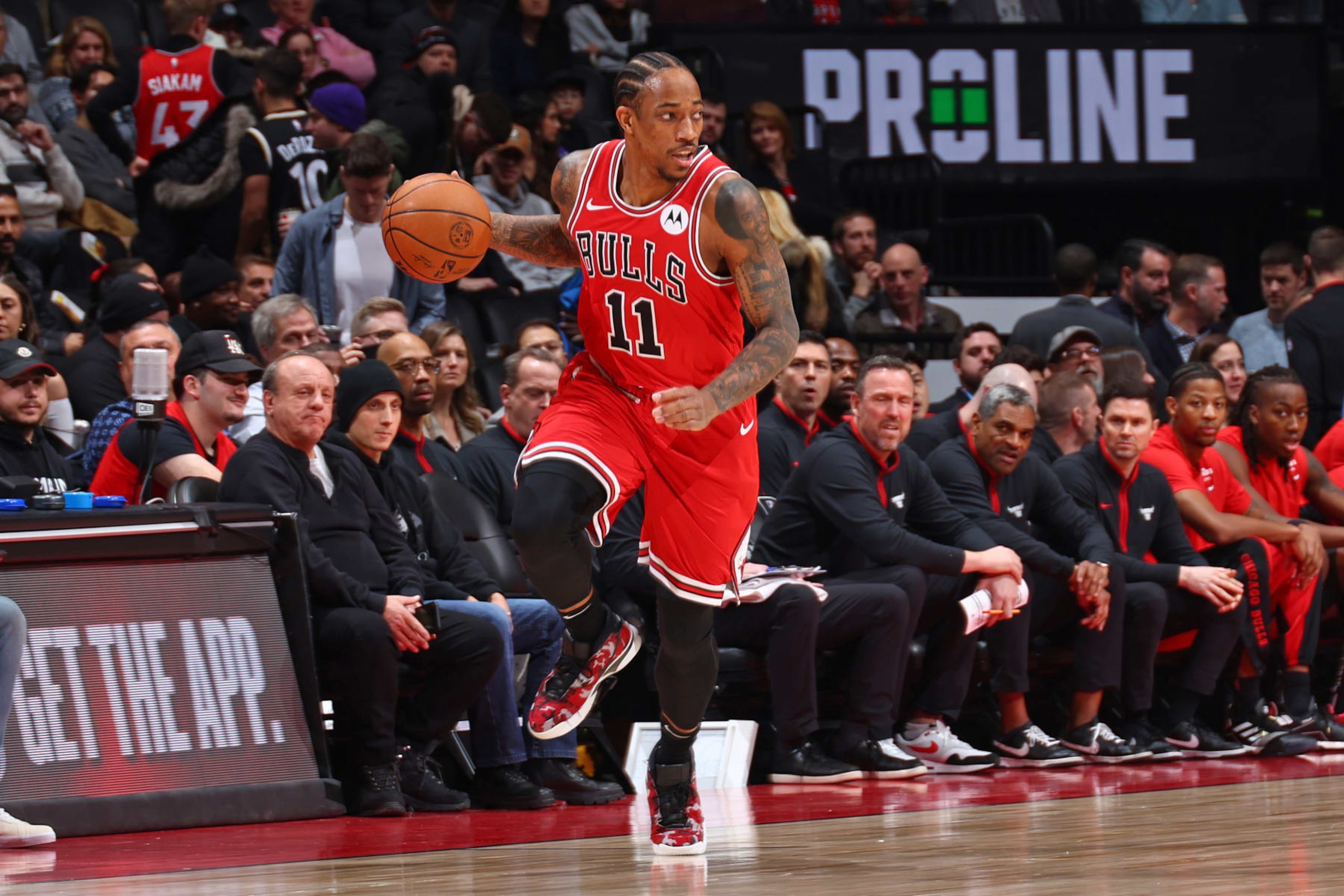 TORONTO, CANADA - JANUARY 18: DeMar DeRozan #11 of the Chicago Bulls dribbles the ball during the game against the Toronto Raptors on January 18, 2024 at the Scotiabank Arena in Toronto, Ontario, Canada.  NOTE TO USER: User expressly acknowledges and agrees that, by downloading and or using this Photograph, user is consenting to the terms and conditions of the Getty Images License Agreement.  Mandatory Copyright Notice: Copyright 2024 NBAE (Photo by Vaughn Ridley/NBAE via Getty Images)