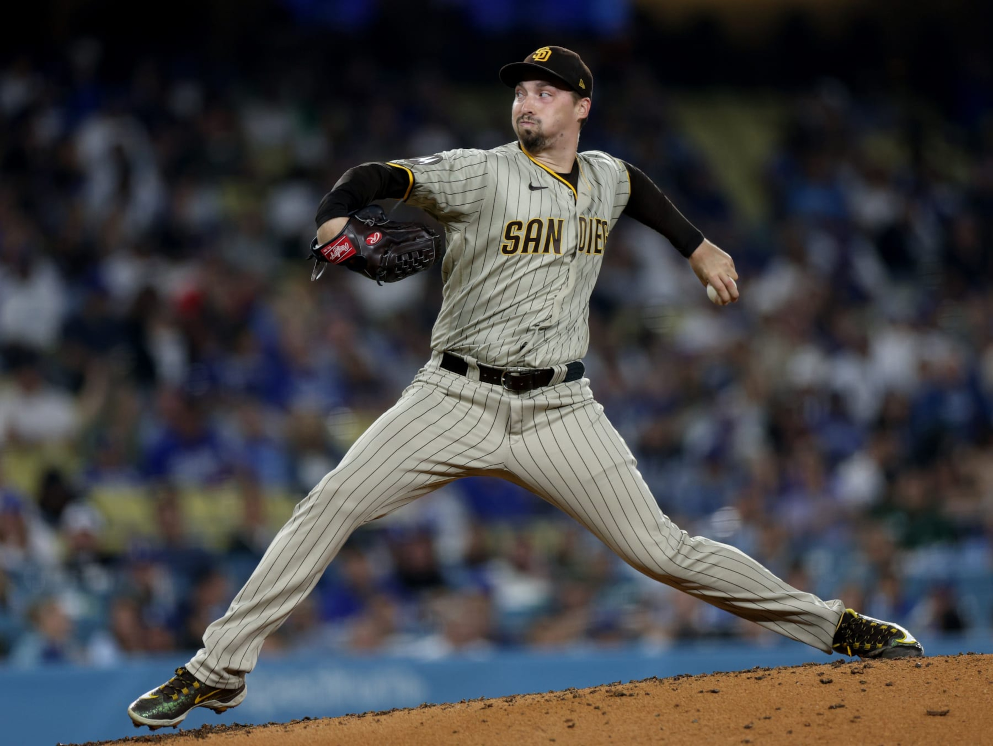 LOS ANGELES, CALIFORNIA - SEPTEMBER 13: Blake Snell #4 of the San Diego Padres pitches during he sixth inning against the Los Angeles Dodgers at Dodger Stadium on September 13, 2023 in Los Angeles, California. (Photo by Harry How/Getty Images)