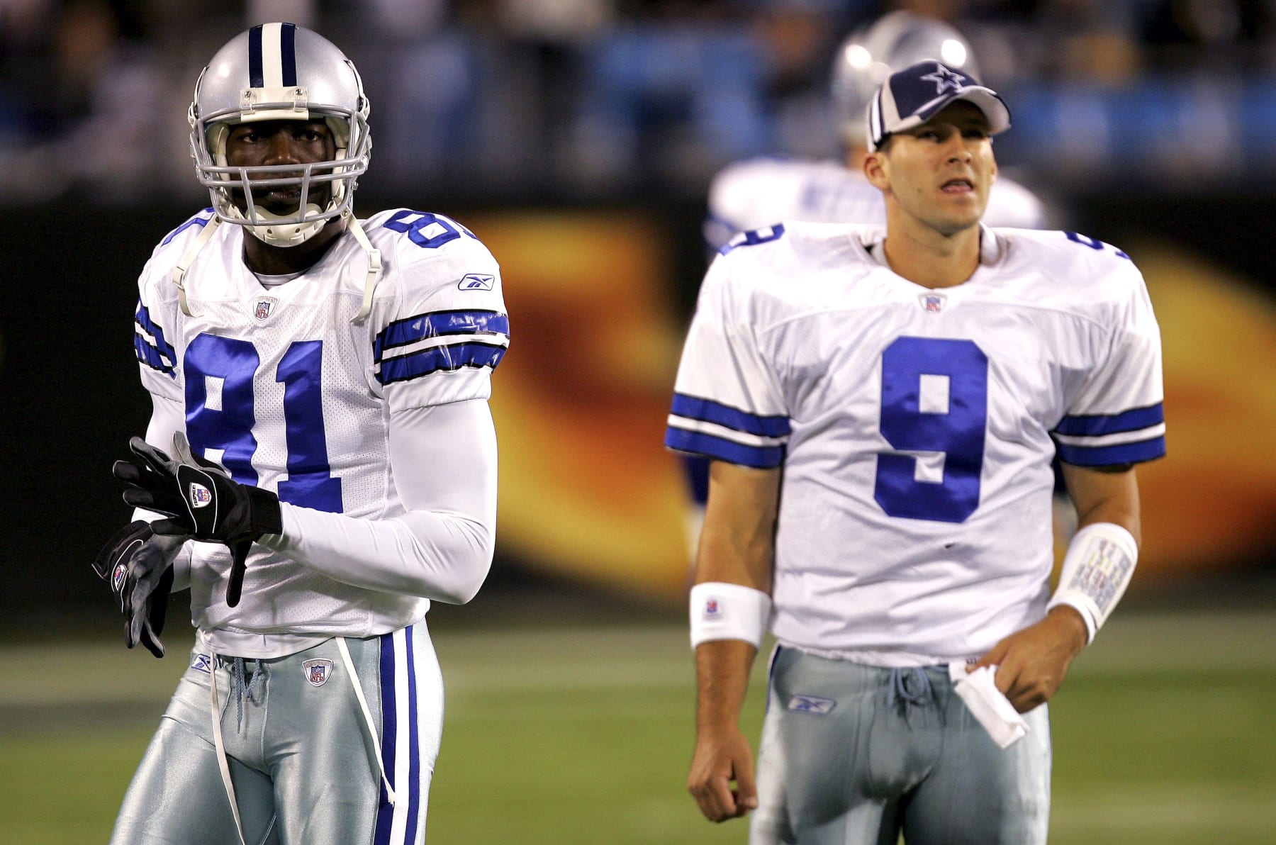 CHARLOTTE, NC - OCTOBER 29:  Terrell Owens #81 of the Dallas Cowboys warms up with teammate Tony Romo #9 before the start of their game against the Carolina Panthers on October 29, 2006 at Bank of America Stadium in Charlotte, North Carolina.  (Photo By Streeter Lecka/Getty Images)