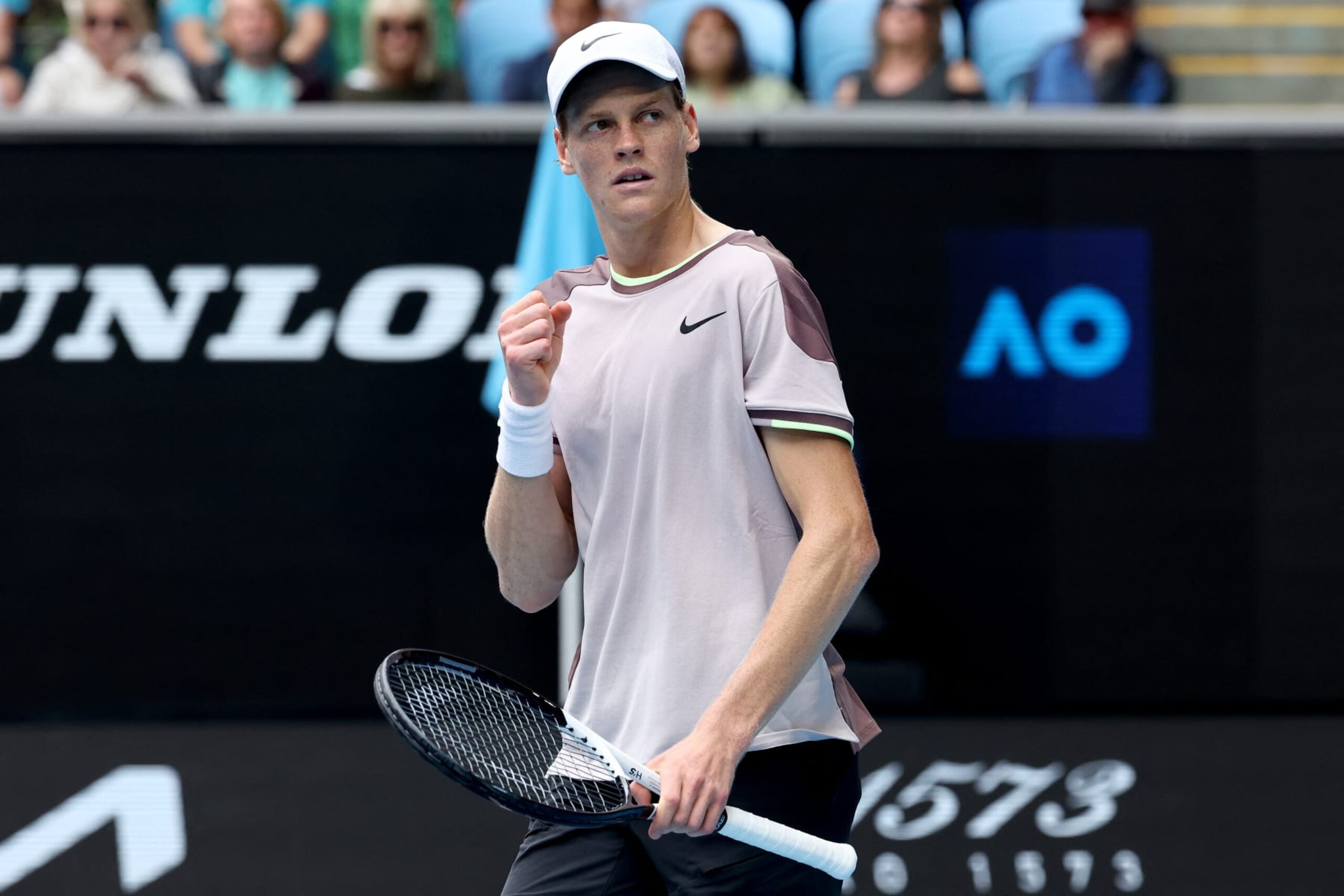 Italy's Jannik Sinner celebrates match point against Argentina's Sebastian Baez during their men's singles match on day six of the Australian Open tennis tournament in Melbourne on January 19, 2024. (Photo by David GRAY / AFP) / -- IMAGE RESTRICTED TO EDITORIAL USE - STRICTLY NO COMMERCIAL USE -- (Photo by DAVID GRAY/AFP via Getty Images)