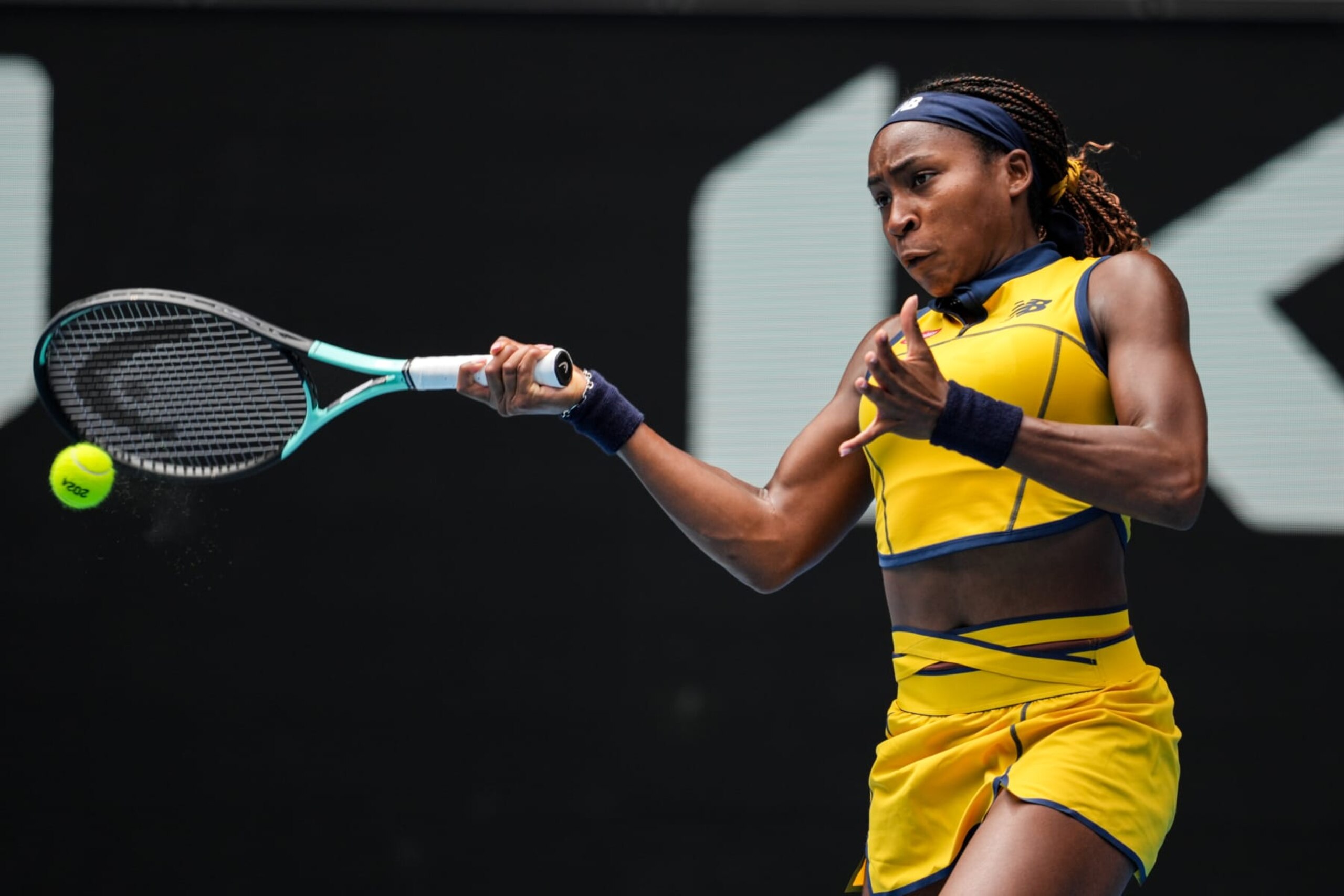 MELBOURNE, AUSTRALIA - JANUARY 19: Coco Gauff of the United States plays a forehand in the Women's Singles Third Round match against Alycia Parks of the United States during day six of the 2024 Australian Open at Melbourne Park on January 19, 2024 in Melbourne, Australia. (Photo by Shi Tang/Getty Images)