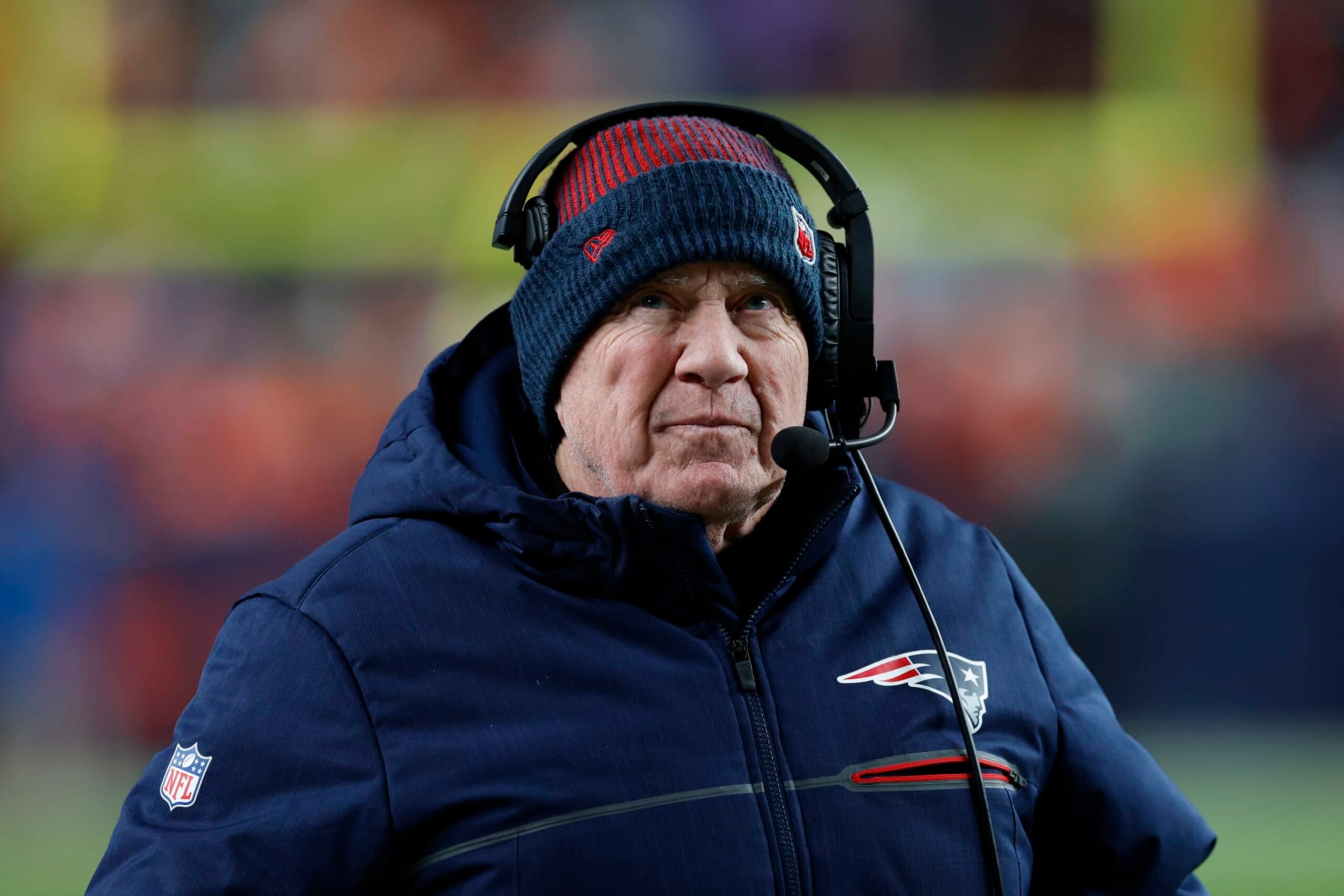 Denver, CO - December 24: New England Patriots head coach Bill Belichick walks the sidelines. The Patriots beat the Denver Broncos, 26-23. (Photo by Danielle Parhizkaran/The Boston Globe via Getty Images)