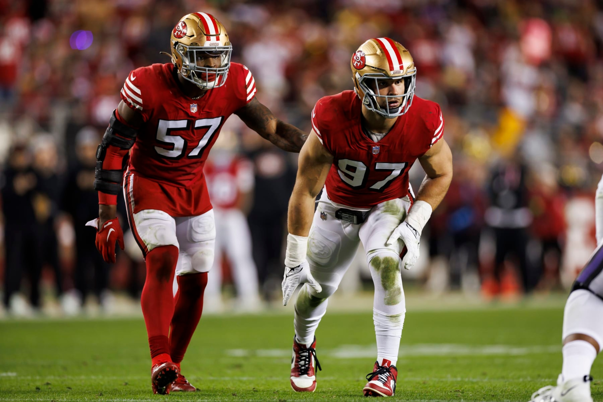 SANTA CLARA, CALIFORNIA - DECEMBER 25: Dre Greenlaw #57 of the San Francisco 49ers and Nick Bosa #97 of the San Francisco 49ers lines up to run around the edge during an NFL football game against the Baltimore Ravens at Levi's Stadium on December 25, 2023 in Santa Clara, California. (Photo by Ryan Kang/Getty Images) SANTA CLARA, CALIFORNIA - DECEMBER 25: Dre Greenlaw #57 of the San Francisco 49ers and Nick Bosa #97 of the San Francisco 49ers lines up to run around the edge during an NFL football game against the Baltimore Ravens at Levi's Stadium on December 25, 2023 in Santa Clara, California. (Photo by Ryan Kang/Getty Images)