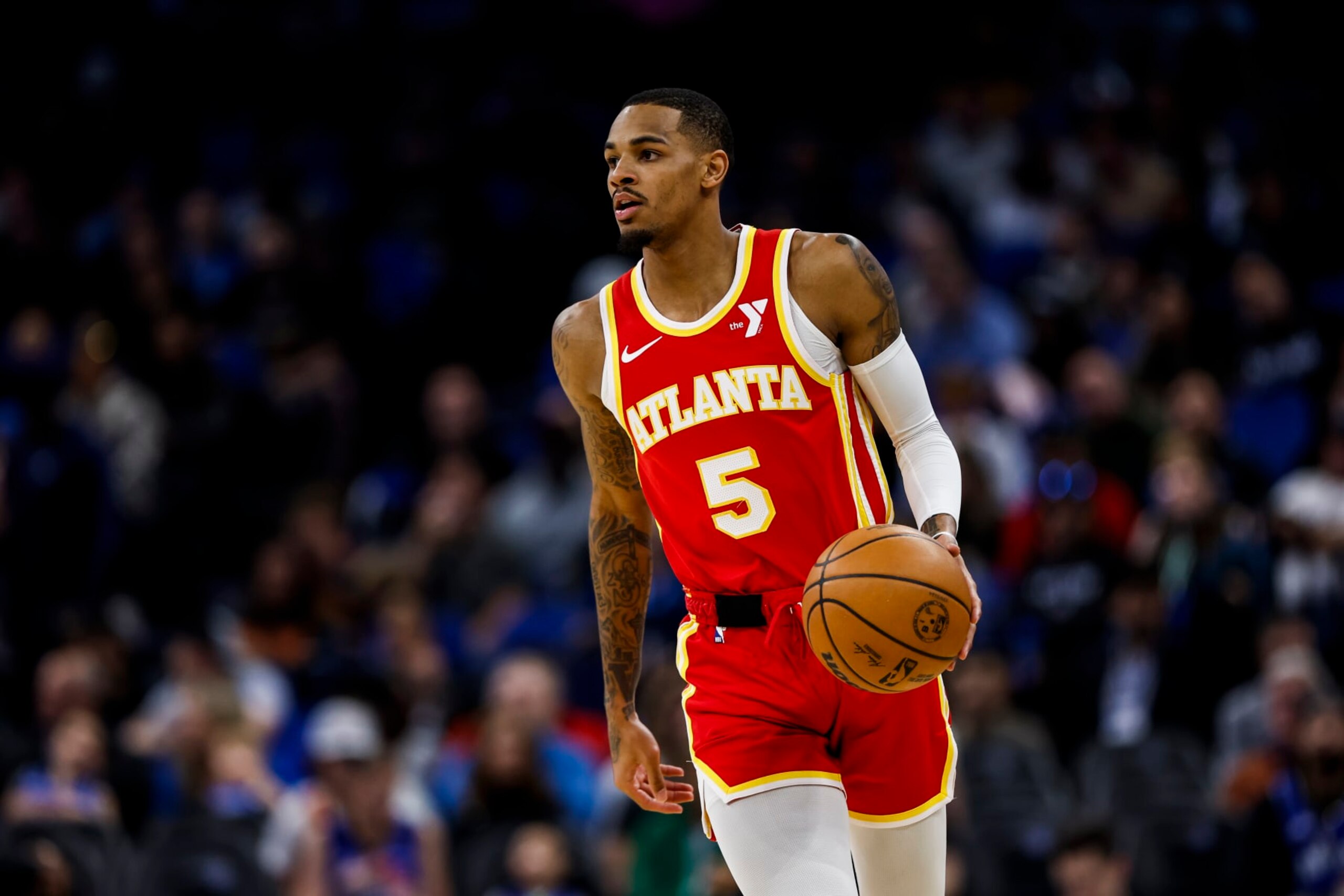ORLANDO, FLORIDA - JANUARY 07: Dejounte Murray #5 of the Atlanta Hawks dribbles the ball during the first half of a game against the Orlando Magic at the Kia Center on January 07, 2024 in Orlando, Florida. NOTE TO USER: User expressly acknowledges and agrees that, by downloading and or using this photograph, User is consenting to the terms and conditions of the Getty Images License Agreement. (Photo by James Gilbert/Getty Images)