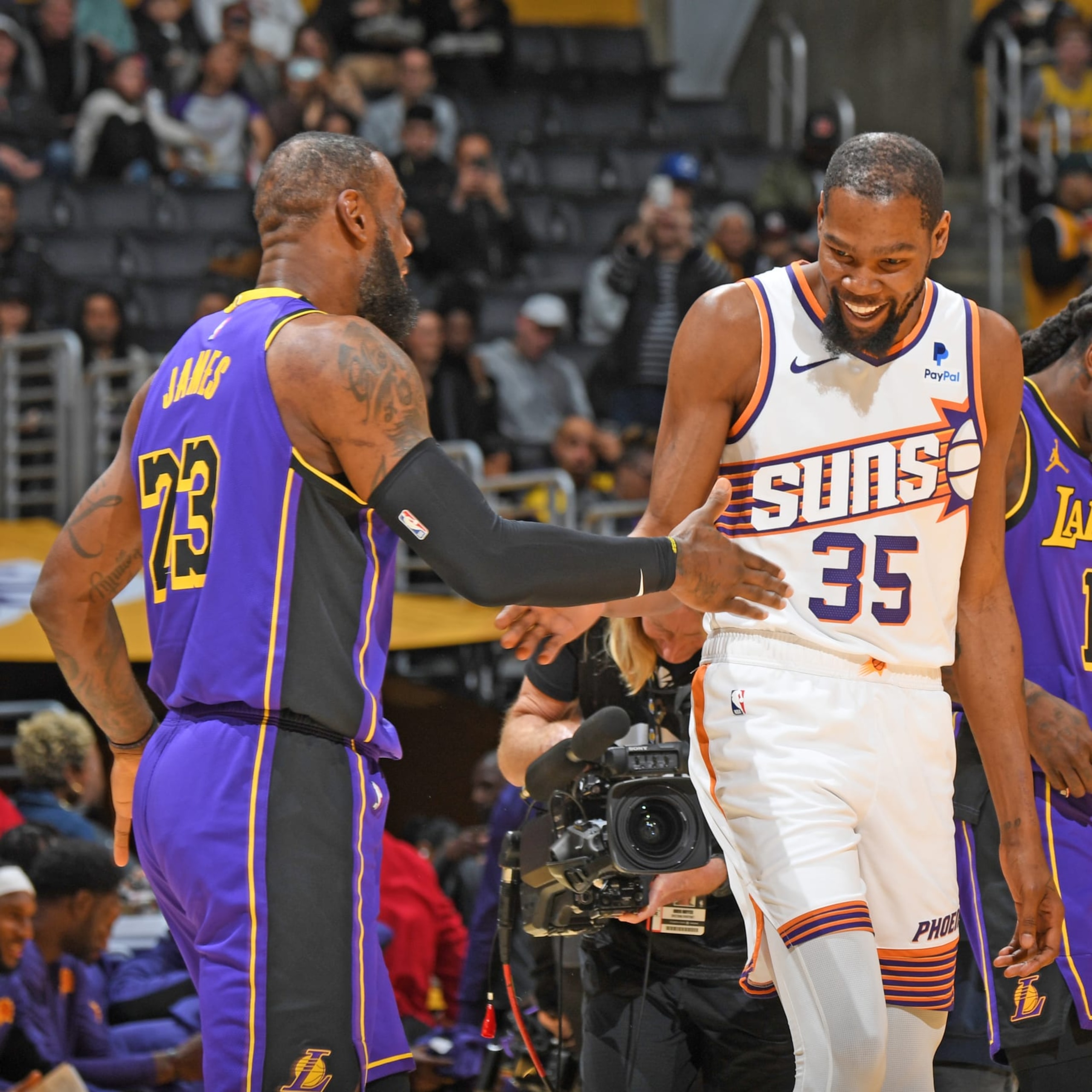 LOS ANGELES, CA - JANUARY 11: LeBron James #23 of the Los Angeles Lakers high fives Kevin Durant #35 of the Phoenix Suns before the game on January 11, 2024 at Crypto.Com Arena in Los Angeles, California. NOTE TO USER: User expressly acknowledges and agrees that, by downloading and/or using this Photograph, user is consenting to the terms and conditions of the Getty Images License Agreement. Mandatory Copyright Notice: Copyright 2024 NBAE (Photo by Andrew D. Bernstein/NBAE via Getty Images) LOS ANGELES, CA - JANUARY 11: LeBron James #23 of the Los Angeles Lakers high fives Kevin Durant #35 of the Phoenix Suns before the game on January 11, 2024 at Crypto.Com Arena in Los Angeles, California. NOTE TO USER: User expressly acknowledges and agrees that, by downloading and/or using this Photograph, user is consenting to the terms and conditions of the Getty Images License Agreement. Mandatory Copyright Notice: Copyright 2024 NBAE (Photo by Andrew D. Bernstein/NBAE via Getty Images)