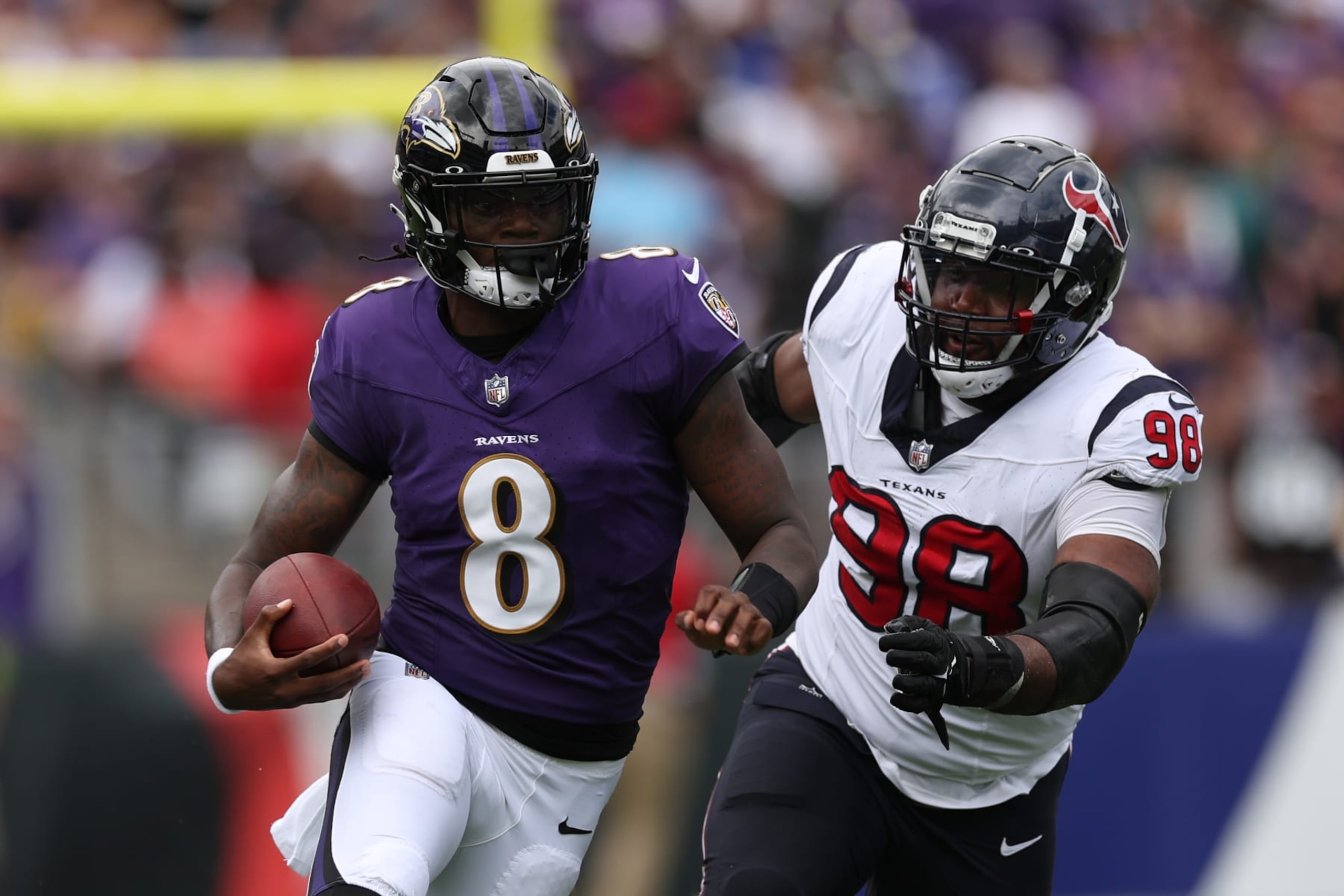 BALTIMORE, MARYLAND - SEPTEMBER 10: Quarterback Lamar Jackson #8 of the Baltimore Ravens rushes against the Houston Texans at M&T Bank Stadium on September 10, 2023 in Baltimore, Maryland. (Photo by Patrick Smith/Getty Images)