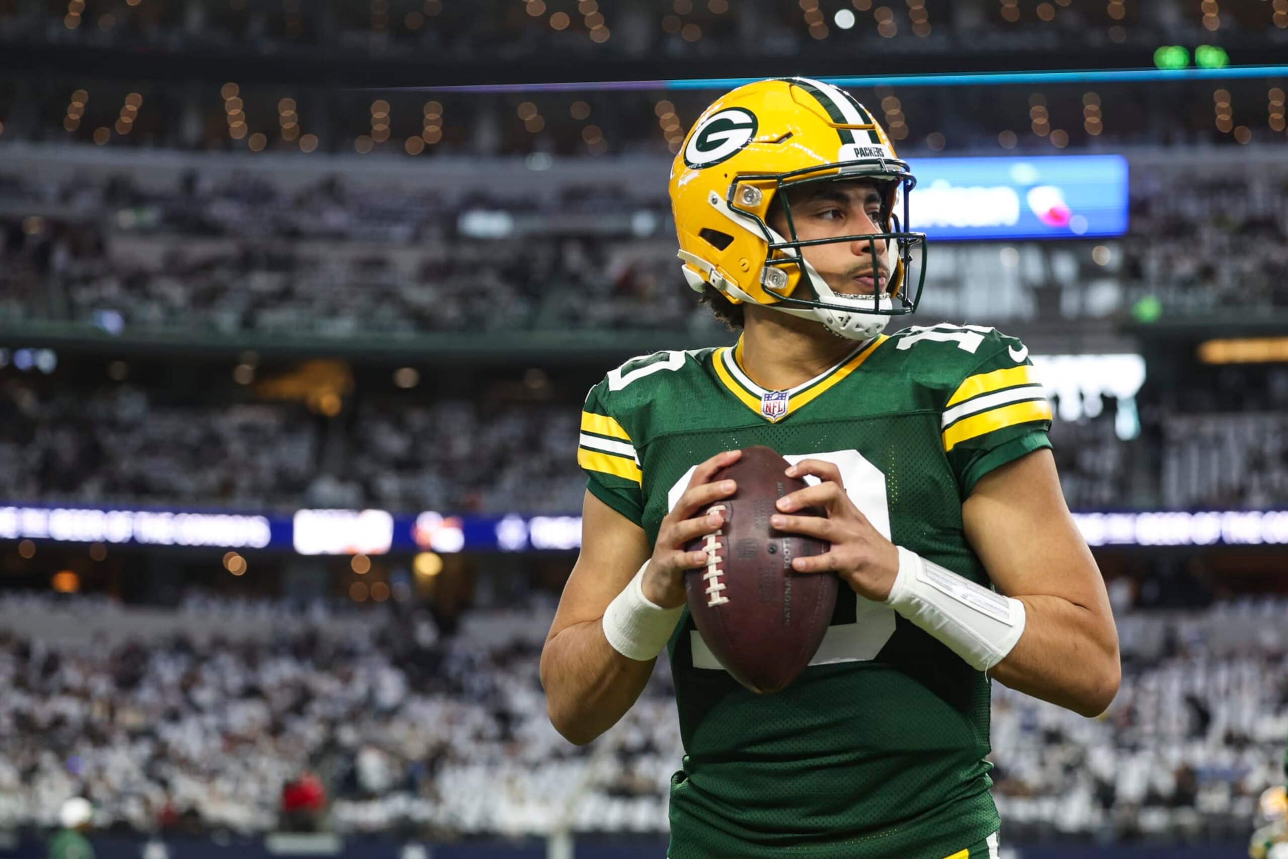 ARLINGTON, TX - JANUARY 14: Jordan Love #10 of the Green Bay Packers warms up prior to an NFL wild-card playoff football game against the Dallas Cowboys at AT&T Stadium on January 14, 2024 in Arlington, Texas. (Photo by Perry Knotts/Getty Images)
