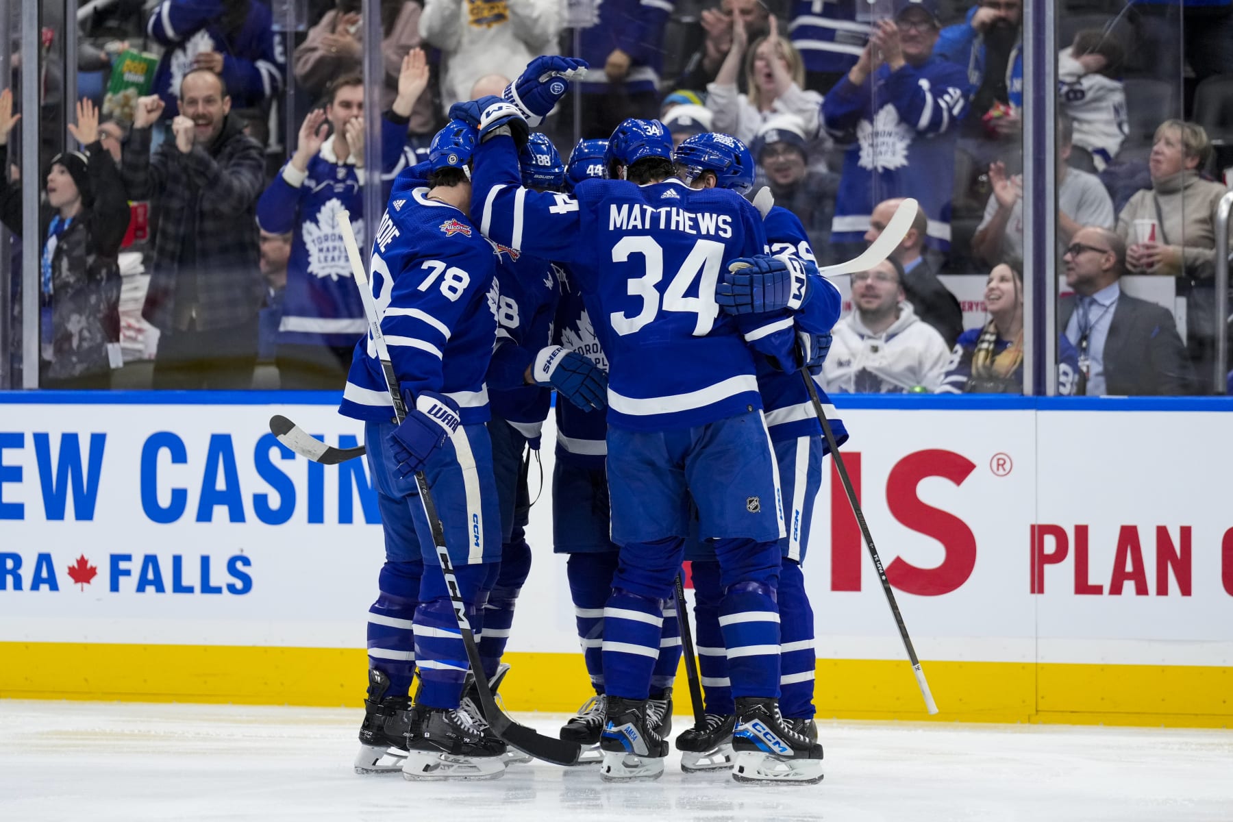 TORONTO, ON - JANUARY 14: Auston Matthews #34 of the Toronto Maple Leafs celebrates after Pontus Holmberg #29 scores against the Detroit Red Wings during the second period at Scotiabank Arena on January 14, 2024 in Toronto, Ontario, Canada. (Photo by Mark Blinch/NHLI via Getty Images)