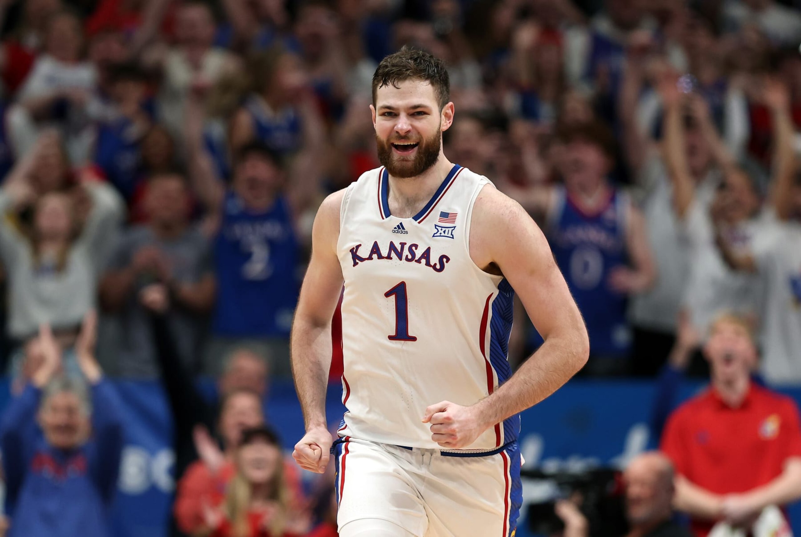 LAWRENCE, KANSAS - JANUARY 06:  Hunter Dickinson #1 of the Kansas Jayhawks reacts after scoring the final basket during the 2nd half against the TCU Horned Frogs as the Jayhawks defeat the Horned Frogs 83-81 to win the game at Allen Fieldhouse on January 06, 2024 in Lawrence, Kansas. (Photo by Jamie Squire/Getty Images)