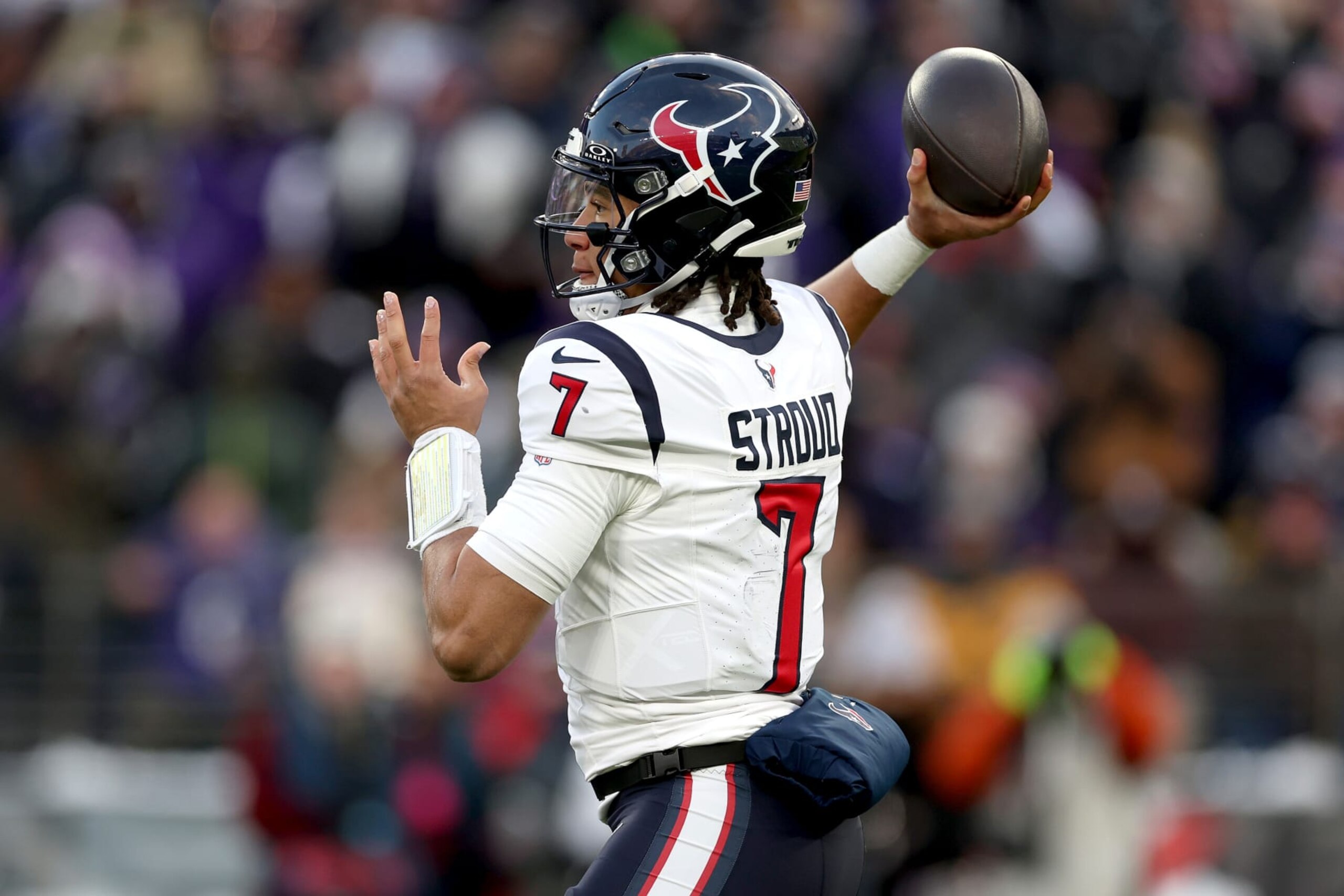 BALTIMORE, MARYLAND - JANUARY 20: C.J. Stroud #7 of the Houston Texans throws a pass against the Baltimore Ravens during the first quarter in the AFC Divisional Playoff game at M&T Bank Stadium on January 20, 2024 in Baltimore, Maryland. (Photo by Rob Carr/Getty Images)