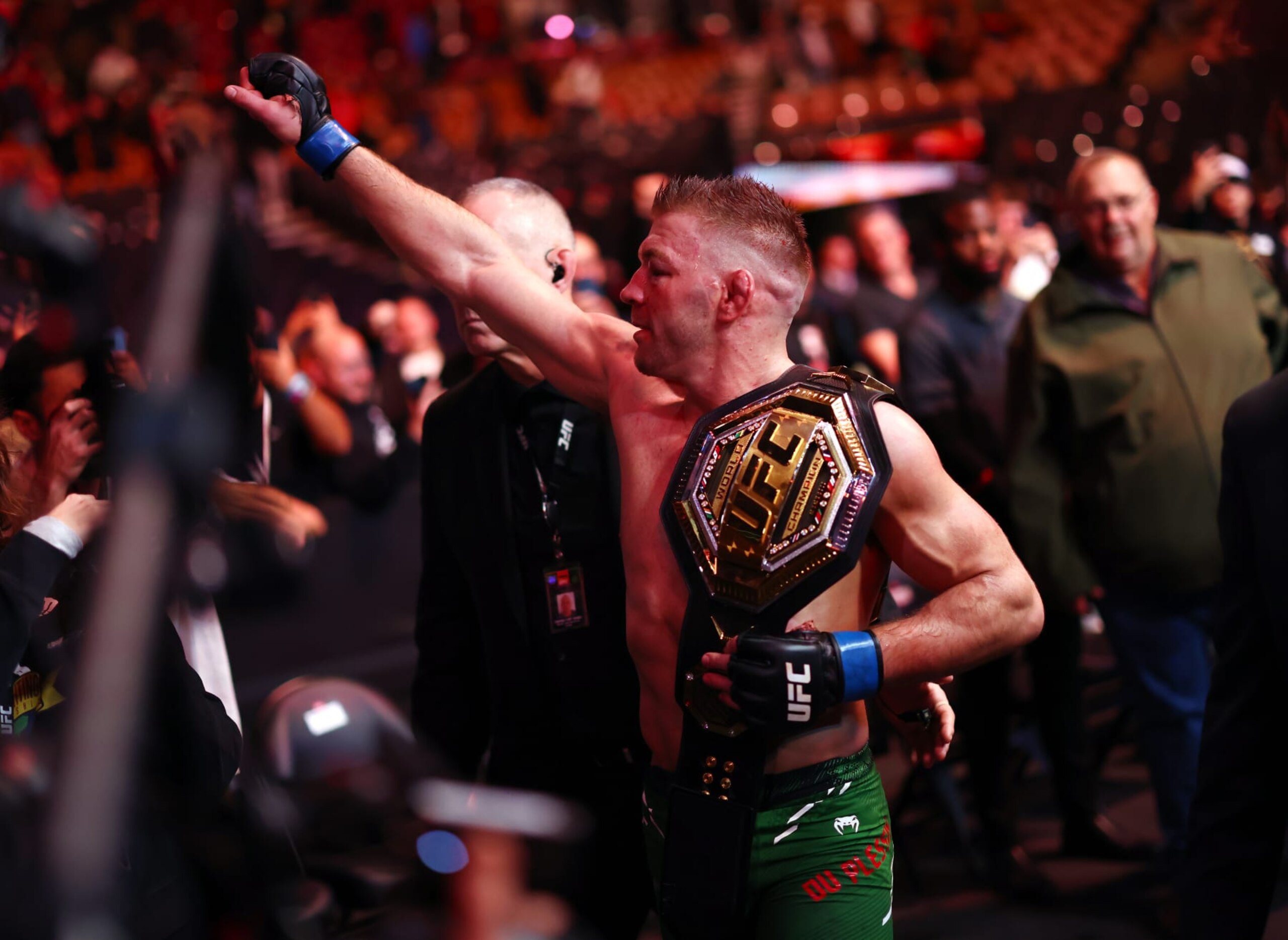 Dricus Du Plessis of South Africa celebrates with the UFC middleweight title belt 
