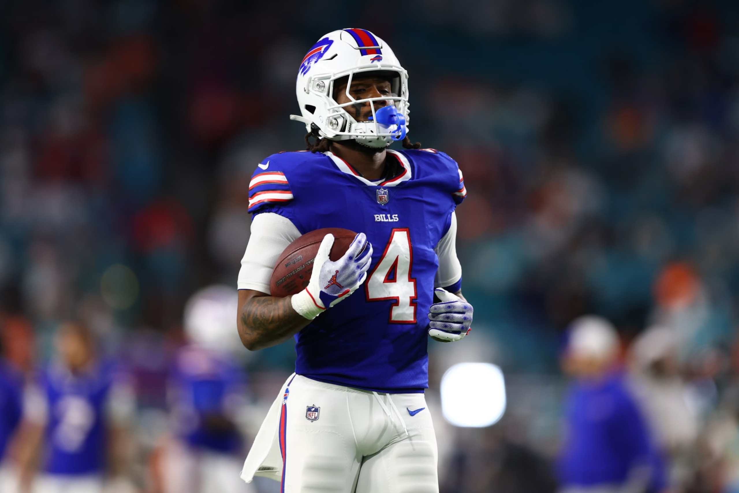 MIAMI GARDENS, FLORIDA - JANUARY 07: James Cook #4 of the Buffalo Bills warms up prior to a game against the Miami Dolphins at Hard Rock Stadium on January 07, 2024 in Miami Gardens, Florida. (Photo by Megan Briggs/Getty Images)