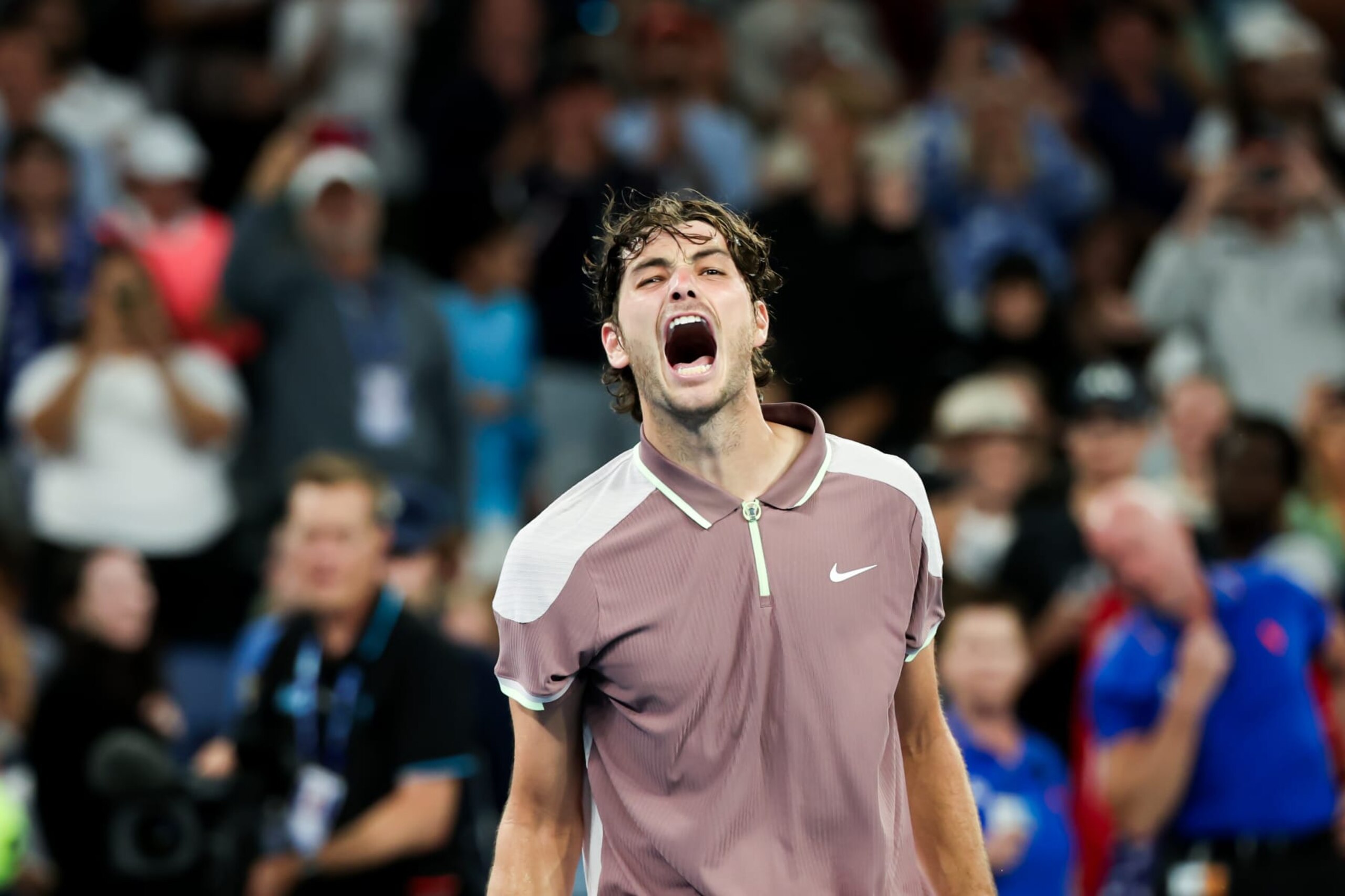MELBOURNE, AUSTRALIA - JANUARY 21, 2024: Taylor Fritz of USA celebrates beating Stefanos Tsitsipas of Greece on Day 8 of the 2024 Australian Open at Melbourne Park. (Photo credit should read Chris Putnam/Future Publishing via Getty Images)
