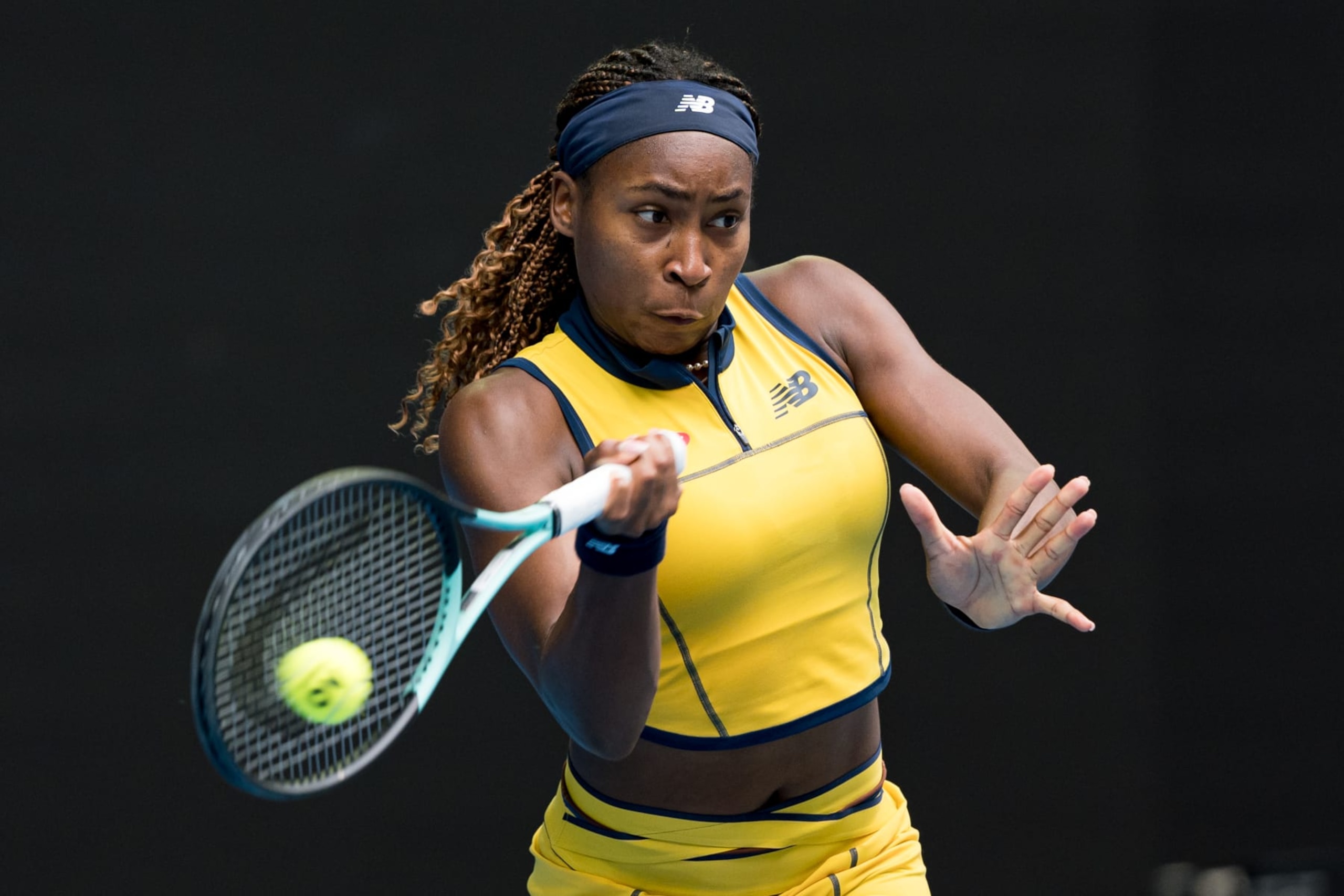 MELBOURNE, AUSTRALIA - JANUARY 21: Coco Gauff of the United States plays a forehand in her round four singles match against Magdalena Frech of Poland during the 2024 Australian Open at Melbourne Park on January 21, 2024 in Melbourne, Australia. (Photo by Andy Cheung/Getty Images)