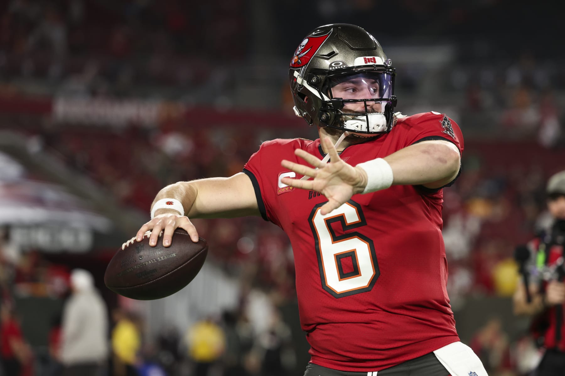 TAMPA, FL - JANUARY 15: Baker Mayfield #6 of the Tampa Bay Buccaneers warms up prior to an NFL Wild Card playoff football game against the Philadelphia Eagles at Raymond James Stadium on January 15, 2024 in Tampa, Florida. (Photo by Perry Knotts/Getty Images)